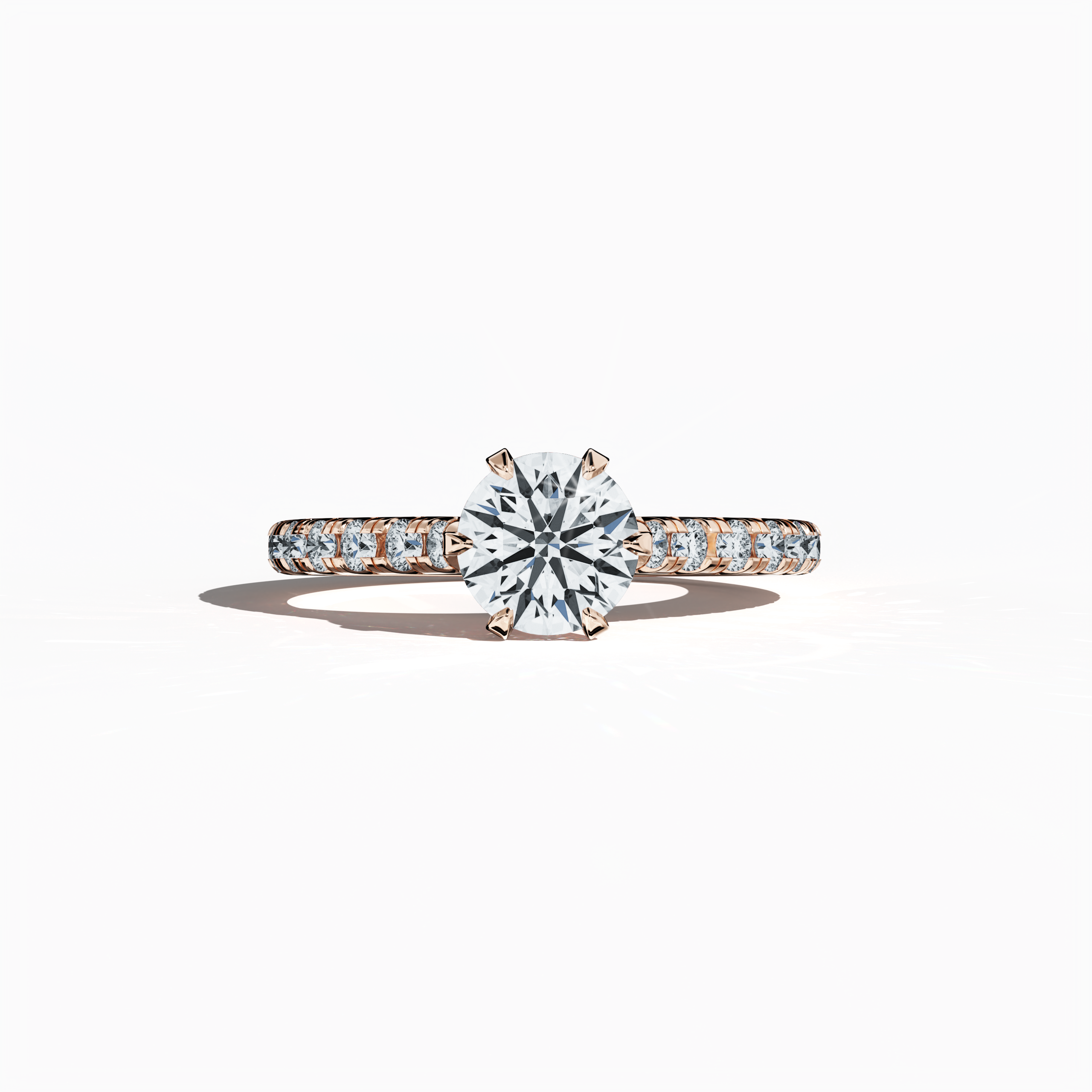 Rose gold solitaire paved ring with a total of 1.21 ct diamond weight, featuring a radiant 1 ct center/centre diamond and 0.21 ct side diamonds, set in a slender diamond slim band with a secure four nail prong setting. This sleeping front view captures the ring’s soft blush tone and refined design, making it an ideal choice as an engagement ring, bridal jewelry/jewellery, or fine jewelry/fine jewellery accessory. Keywords: rose gold, paved ring, diamond slim band, luxury, 1.21 ct, refined design.