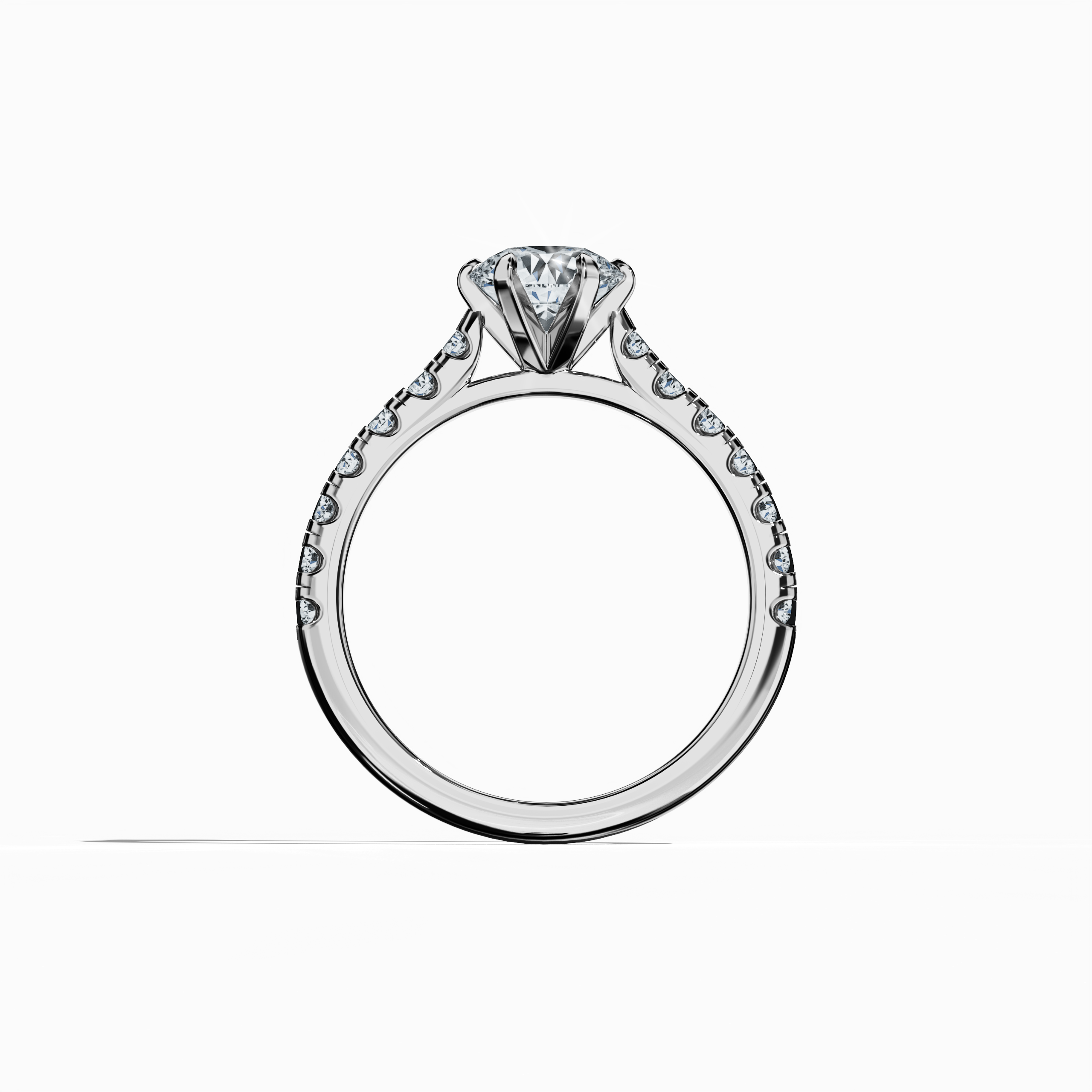 Standing front view of a белое золото solitaire paved кольцо, featuring a dazzling 1 ct center/centre бриллиант paired with 0.21 ct side бриллианты in a sleek бриллиант slim band with a secure four nail prong setting. This image highlights its contemporary design and timeless sophistication, making it perfect as an engagement кольцо, bridal jewelry/jewellery, or fine jewelry/fine jewellery statement. Keywords: белое золото, paved кольцо, бриллиант slim band, luxury, 1.21 ct, modern elegance.