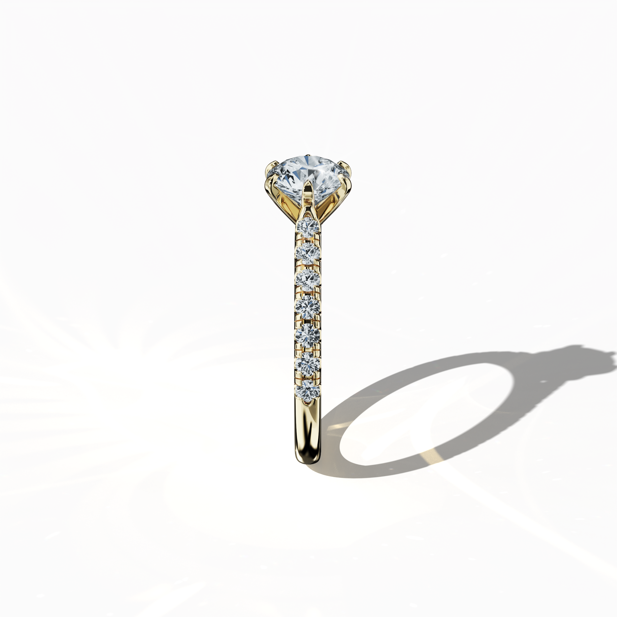 Side view of a жёлтое золото solitaire paved ring, highlighting a radiant 1 карат center/centre diamond and 0.21 карат side diamonds along a slim band set in a four nail prong design. This perspective emphasizes the ring’s elegant profile and luminous finish, making it an exquisite engagement ring, wedding band, or fine Украшения/fine Ювелирные изделия accessory. Keywords: жёлтое золото, paved ring, diamond slim band, luxury, 1.21 карат, luminous elegance.