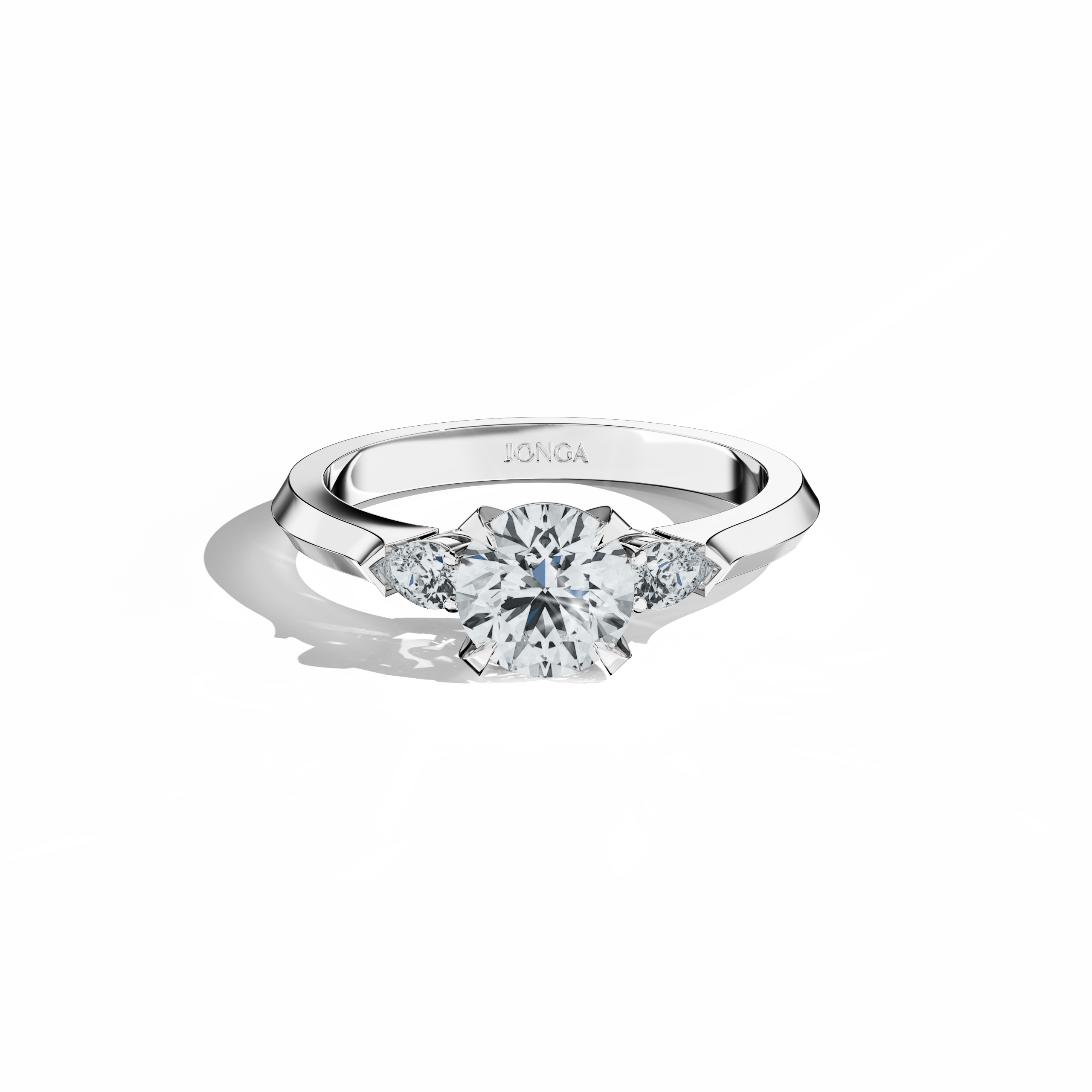 Sleeping front top view of a white gold trio diamond ring with 1.30 ct natural diamond weight, featuring a 1 ct round center/centre diamond and two pear‑shaped side diamonds (0.30 ct total) set in a slim band with a four‑nail prong design. This image highlights precise craftsmanship and subtle sparkle, offering modern elegance. Known as a trilogy ring, three‑stone ring, three‑diamond ring, trinity ring, and triptych ring design, this fine jewelry/fine jewellery piece suits engagements and celebrations.