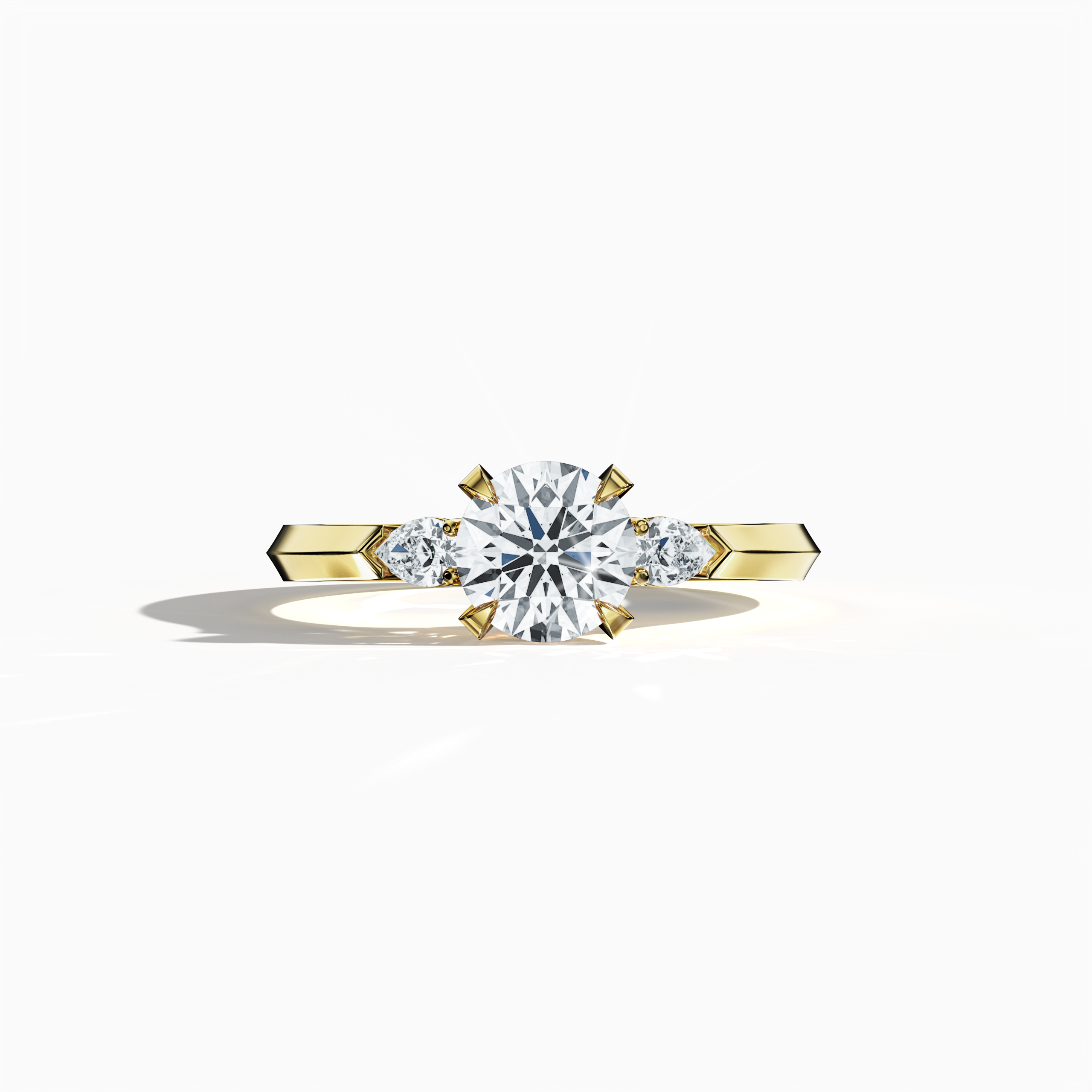 Yellow gold trio diamond ring with 1.30 ct natural diamonds—a 1 ct round center/centre diamond flanked by two pear‐shaped side diamonds (0.30 ct total). Captured in a sleeping front view, its warm, radiant hue and refined four‐nail prong setting exude sophistication as an engagement ring, wedding band, or fine jewelry/fine jewellery piece. Also known as a trilogy ring, three‐stone ring, three‐diamond ring, trinity ring, and triptych ring design. Keywords: yellow gold, trio diamond ring, radiant.