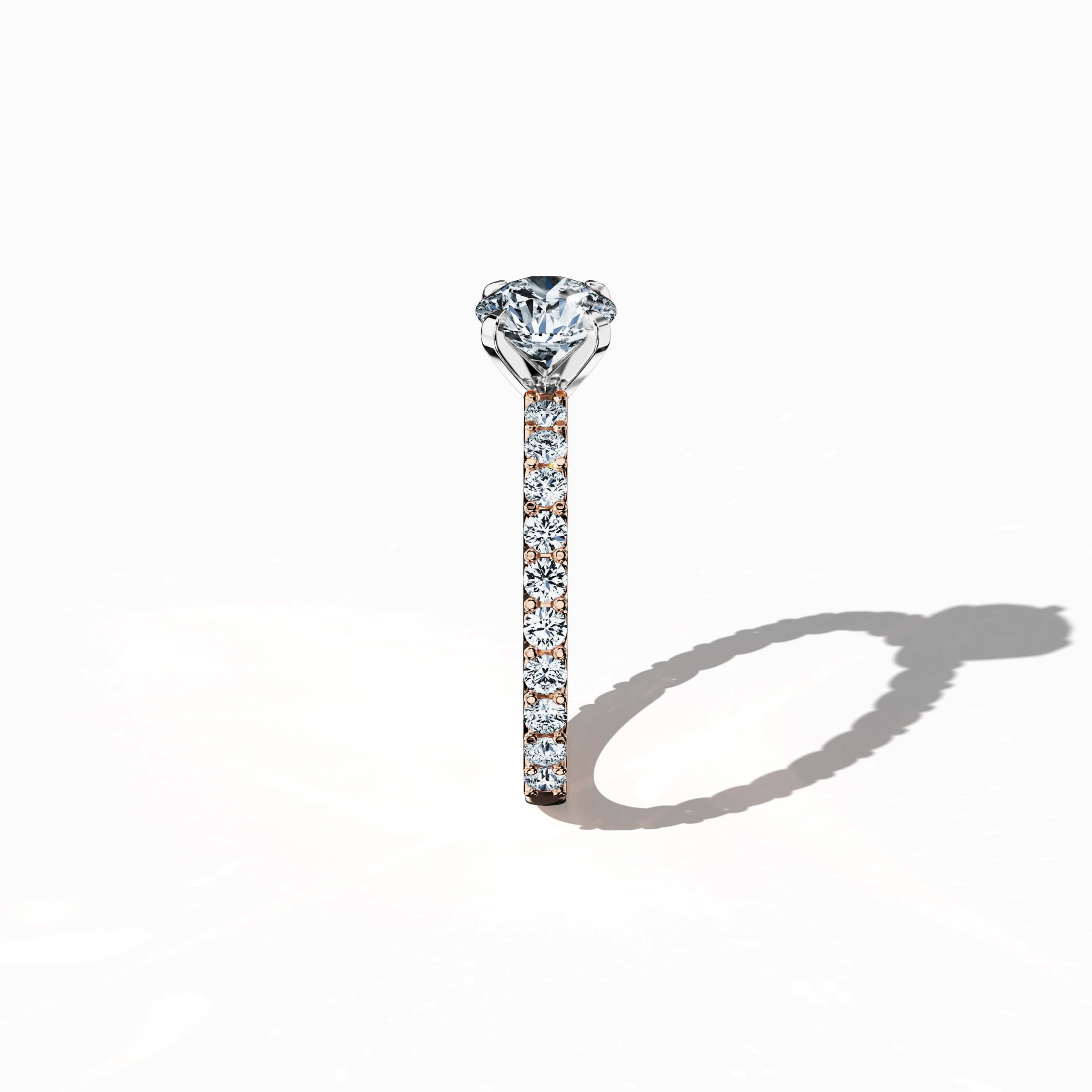 Side view of a розовое золото solitaire Eternity ring, showcasing a dazzling 1 карат center/centre diamond and 0.80 карат side diamonds in a four-nail prong setting. The intricate craftsmanship makes it a perfect engagement, bridal, or anniversary Украшения/Ювелирные изделия piece. Recognized as a wedding band, diamond ring, or eternity band, it represents timeless love. Keywords: розовое золото, solitaire, diamond eternity band, luxury ring, wedding band, fine Ювелирные изделия, 1.80 карат.