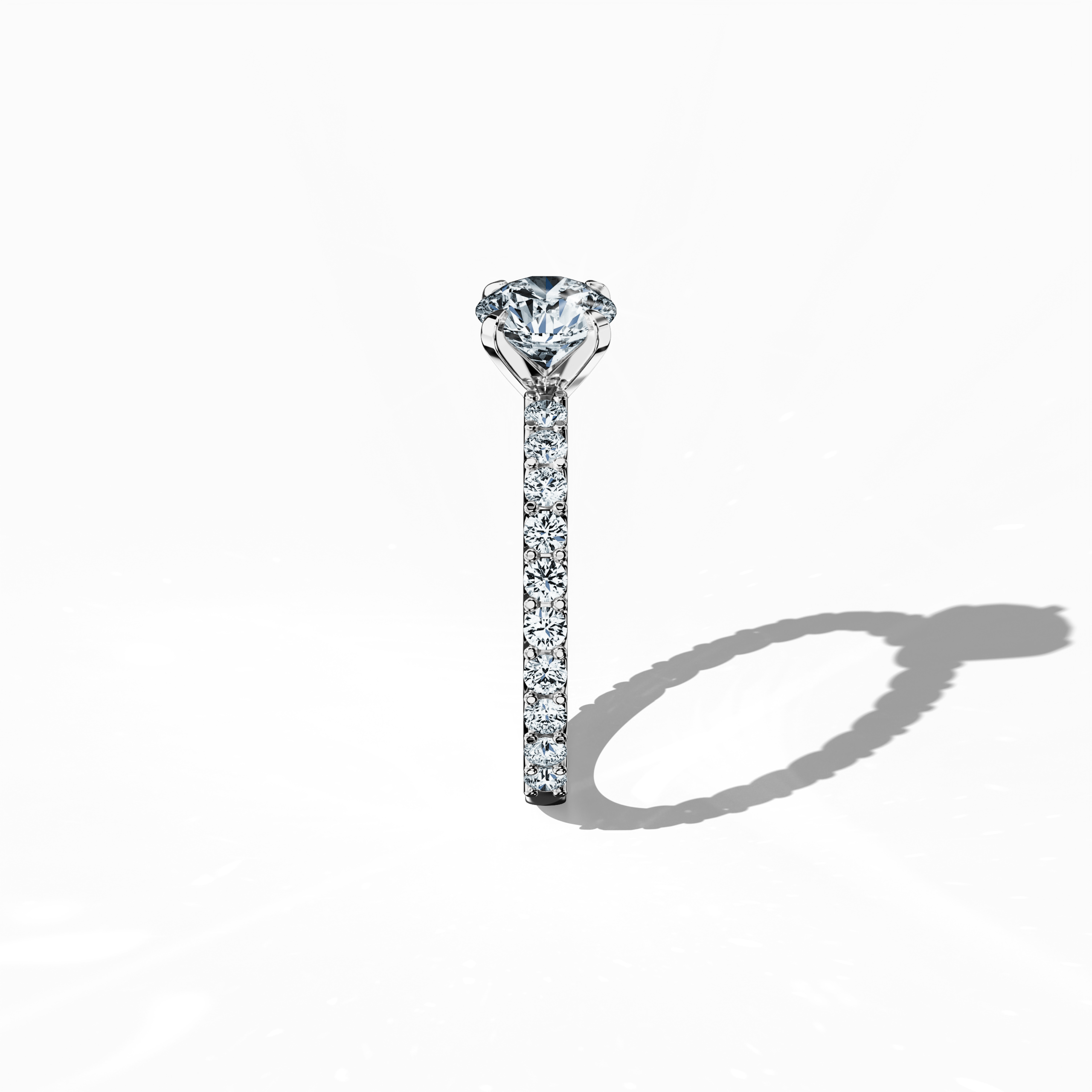 Side profile of a белое золото solitaire Eternity ring with a 1 карат center/centre diamond and 0.80 карат side diamonds, secured in a four-nail prong setting. This image highlights the elegant curvature and structure, making it a refined choice for engagement, bridal, or anniversary Украшения/Ювелирные изделия. Often called a wedding band, diamond ring, or eternity band, it symbolizes everlasting love. Keywords: белое золото, solitaire, diamond eternity band, luxury ring, wedding ring, 1.80 карат.