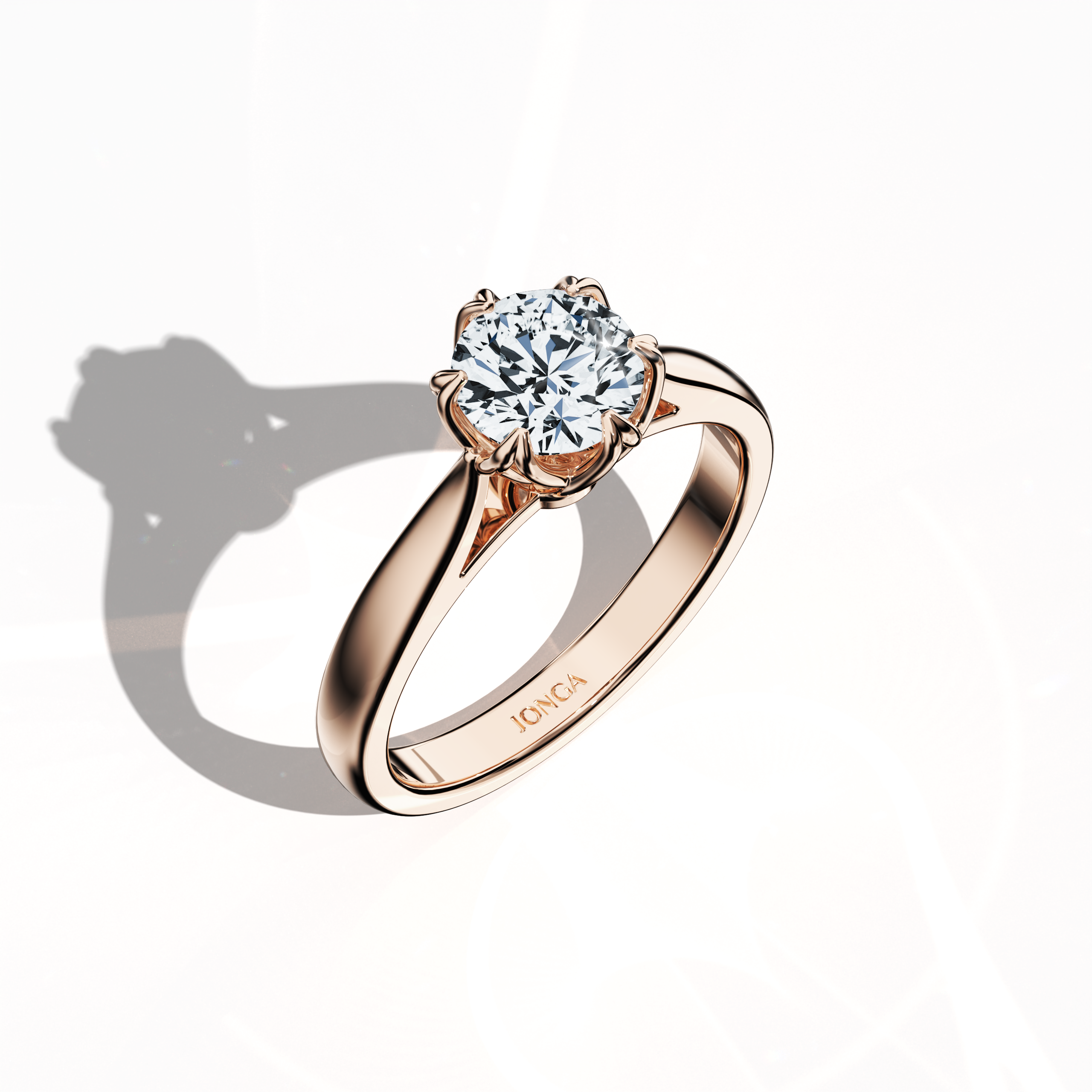 Stylish 1‑carat lotus solitaire ring featuring a 1‑carat center diamond in a lotus‑inspired setting with six matching prongs and a uniquely twisted band, all crafted entirely in soft розовое золото (blush/pink gold). Captured from a standing front top side angle, this fine Украшения/fine Ювелирные изделия ring emphasizes its brilliant diamond and elegant, artistic design.