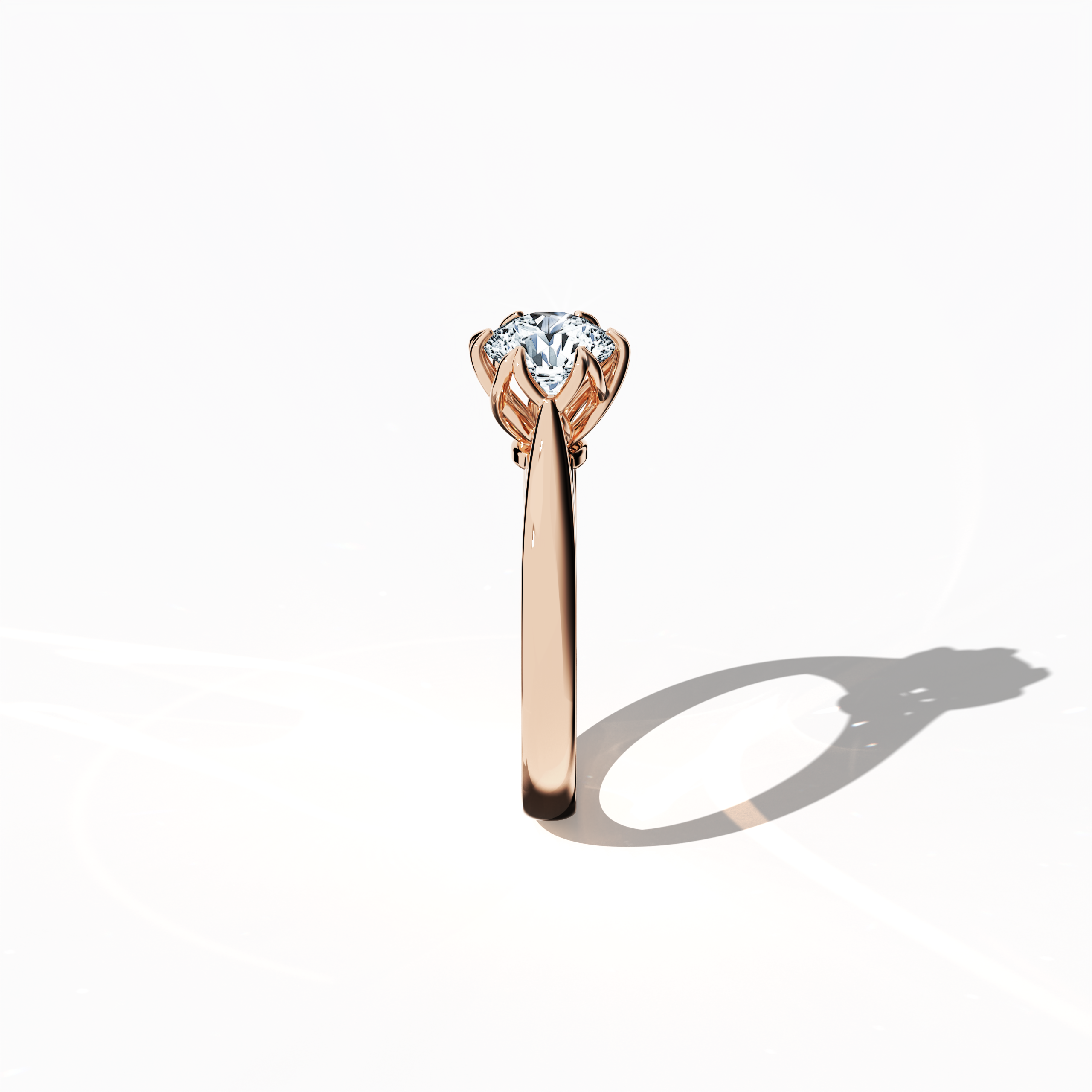 Modern 1‑carat lotus solitaire ring with a 1‑carat center diamond in a lotus‑inspired design, secured by six uniform prongs and a uniquely twisted band, all in soft розовое золото (blush/pink gold). Photographed from a standing side view, this fine Украшения/fine Ювелирные изделия ring reveals its graceful profile and warm, refined allure.