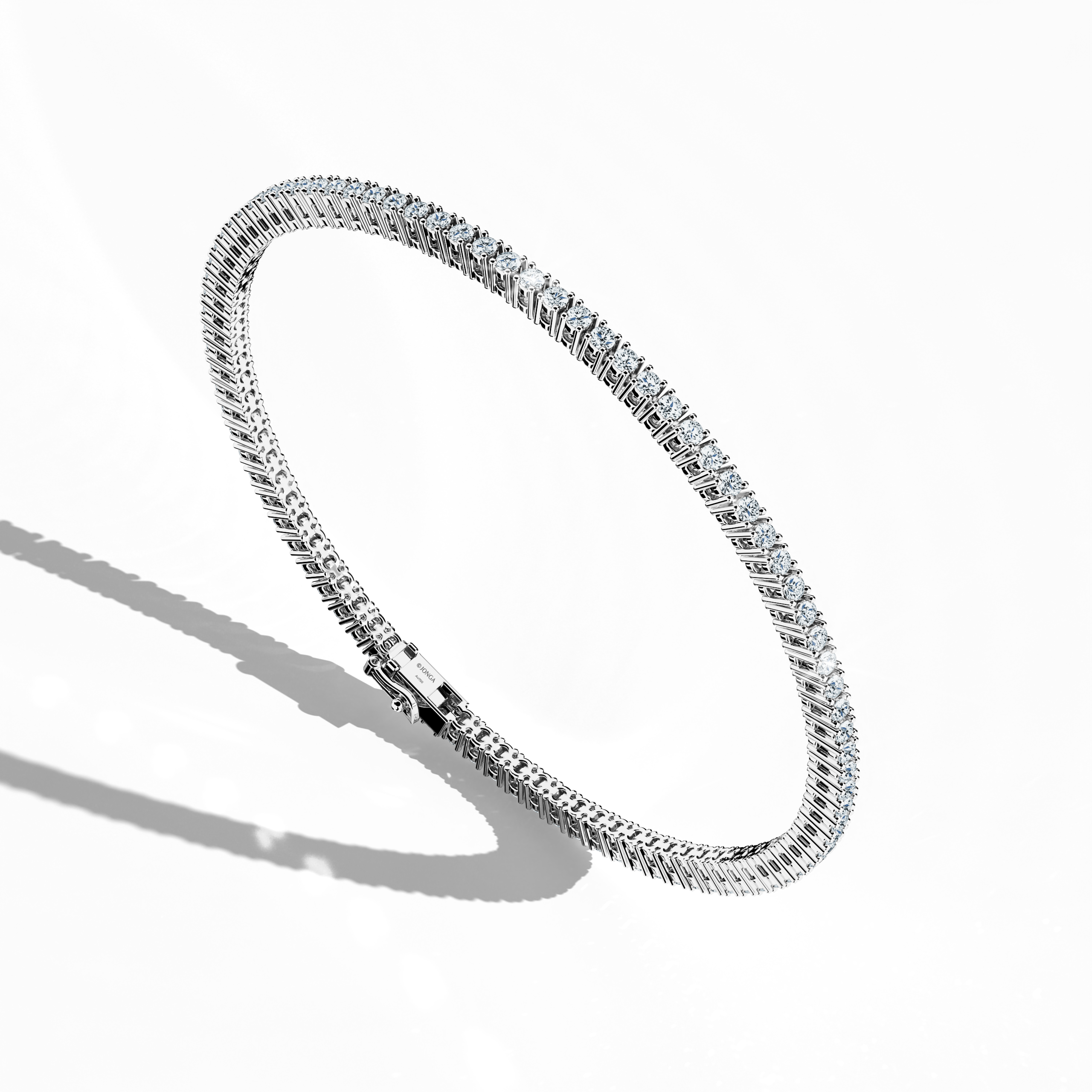 In a dynamic standing front top side view, this remarkable 2-carat diamond tennis bracelet in brilliant белое золото—known as blanc or silver‑toned gold—displays a harmonious alignment of sparkling diamonds. Crafted with exceptional precision, this fine Украшения/jewellry design, often termed a diamond wristband, diamond cuff, or elegant arm candy, fuses contemporary style with enduring sophistication. International appeal and meticulous detailing make this luxury accessory truly distinctive.