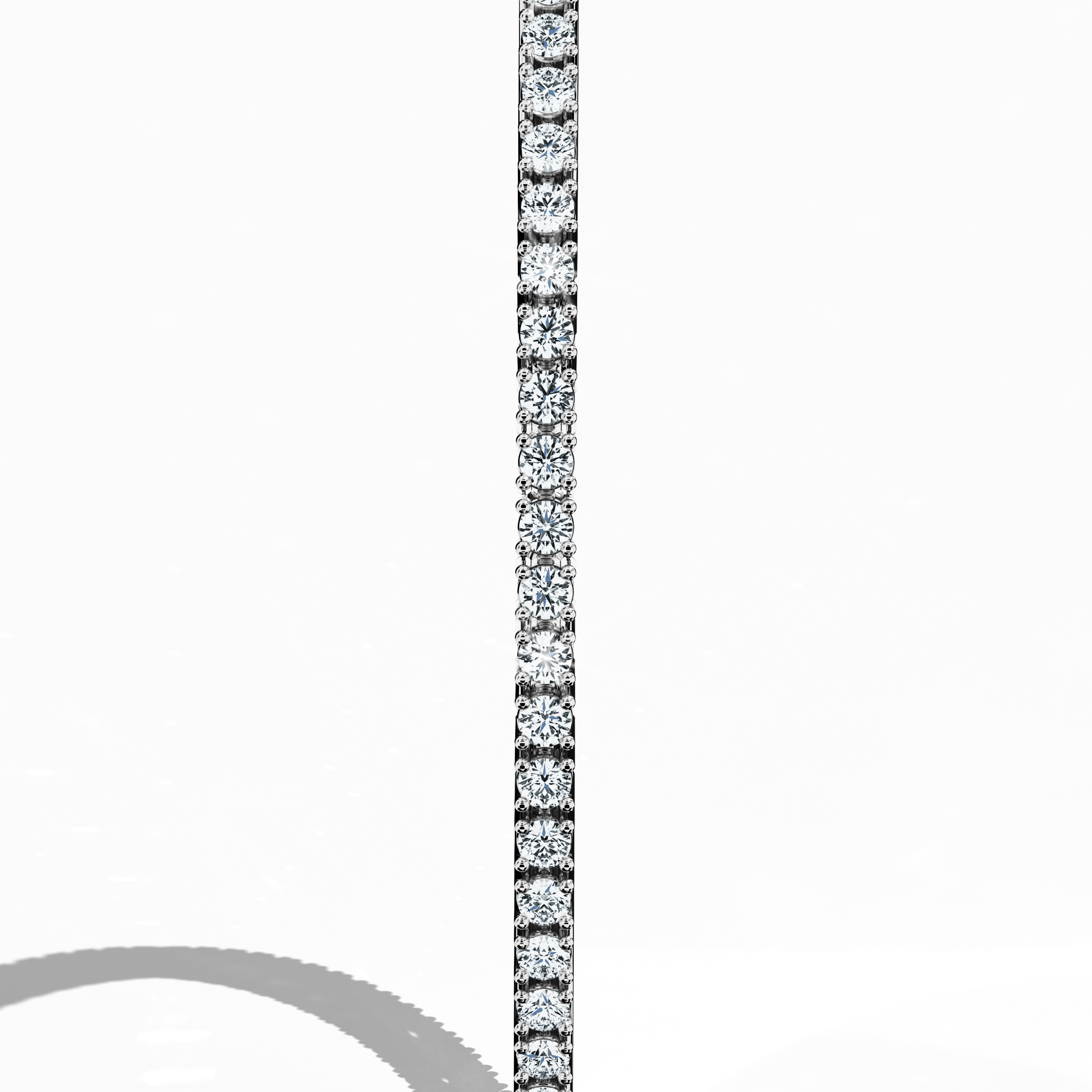 Displayed in a striking standing side view, this 2-carat diamond tennis bracelet in luminous белое золото—alternatively known as blanc or silver‑toned gold—showcases a sleek, unbroken band of brilliant diamonds. Expertly crafted as a piece of fine Украшения/jewellry, its refined design is recognized as a diamond wristband, diamond cuff, or stylish arm candy. Marrying contemporary style with timeless charm, this luxurious accessory captures international appeal and impeccable artistry.