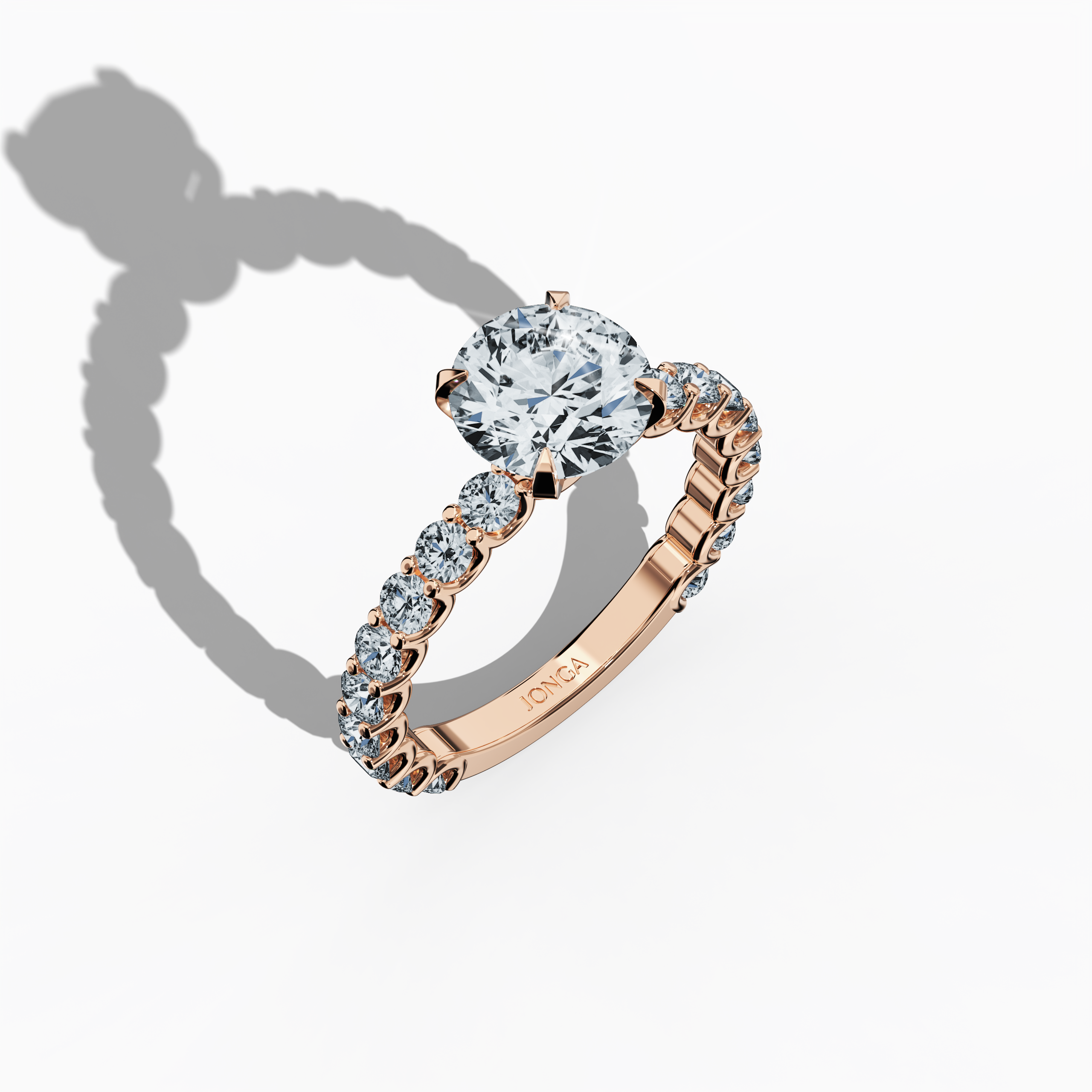 Front top side view of a розовое золото solitaire Eternity ring with a brilliant 2 карат center/centre diamond and 1.30 карат side diamonds in a four-nail prong setting. This diamond eternity band, wedding band, or engagement ring is perfect for bridal occasions or anniversary celebrations. A stunning fine Украшения/fine Ювелирные изделия masterpiece. Keywords: розовое золото, solitaire, eternity ring, bridal Украшения/Ювелирные изделия, luxury, diamond ring, 3.30 карат, elegant statement.