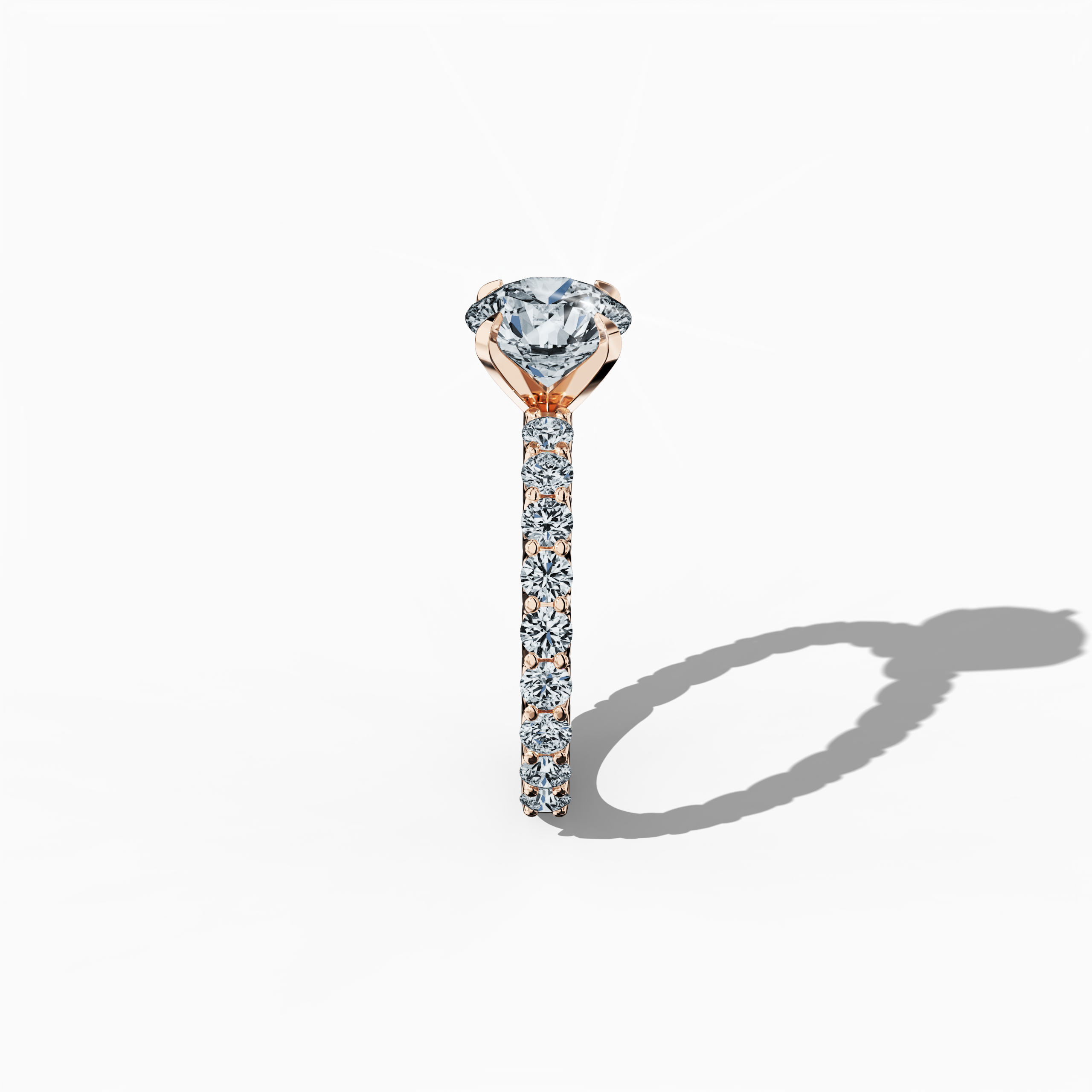 Side profile of a розовое золото solitaire Eternity ring, showcasing a breathtaking 2 карат center/centre diamond and 1.30 карат side diamonds in a four-nail prong setting. The delicate curvature enhances its elegance, making it ideal as an engagement, bridal, or anniversary Украшения/Ювелирные изделия piece. Keywords: розовое золото, solitaire, diamond eternity band, luxury ring, wedding band, fine Ювелирные изделия, 3.30 карат, high-end design, timeless beauty.