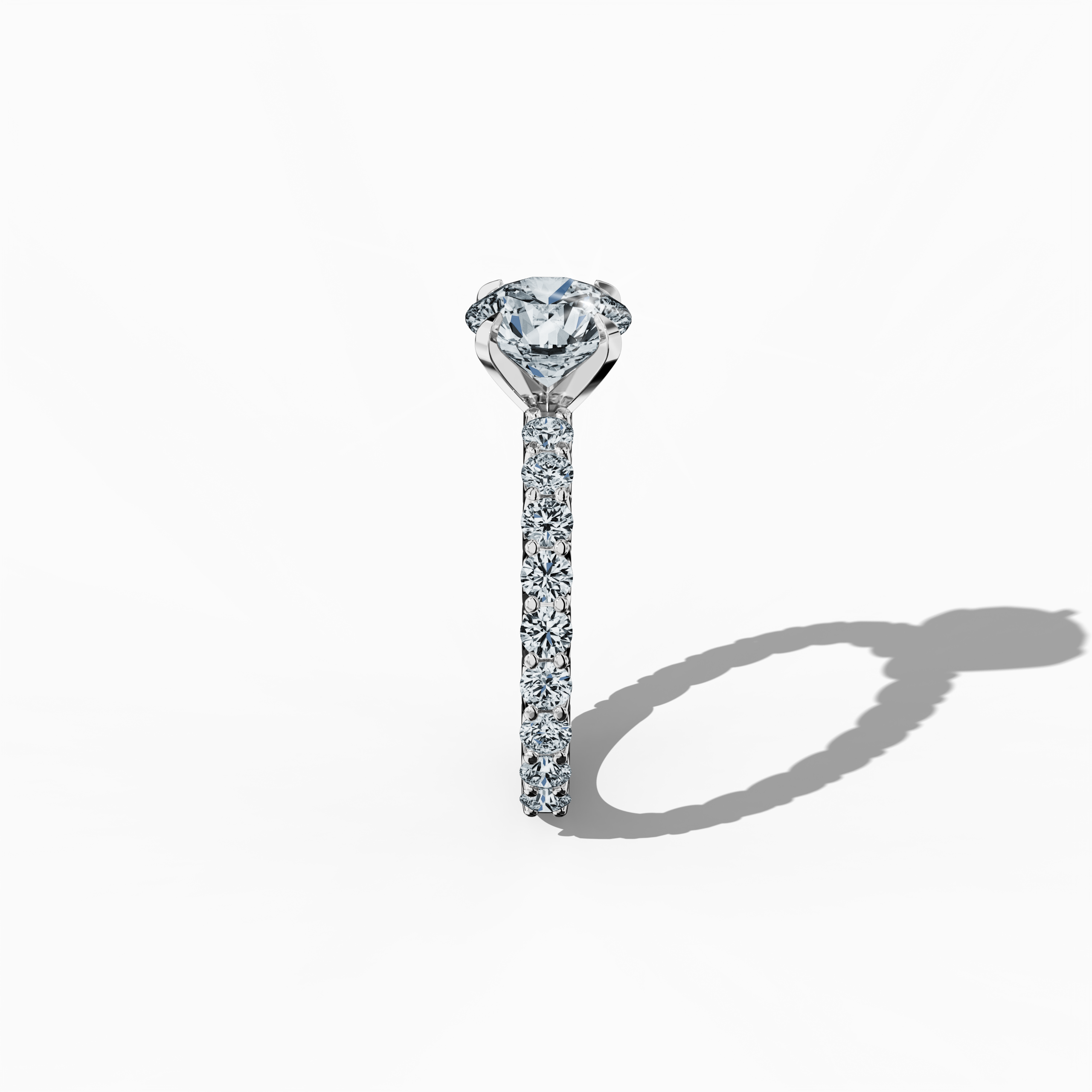 Side profile of a белое золото solitaire Eternity ring with a 2 карат center/centre diamond and 1.30 карат side diamonds, secured in a four-nail prong setting. This view highlights its graceful curvature and brilliance, making it a refined engagement, bridal, or anniversary Украшения/Ювелирные изделия choice. Keywords: белое золото, solitaire, diamond eternity band, luxury ring, wedding ring, fine Ювелирные изделия, 3.30 карат, high-end craftsmanship.