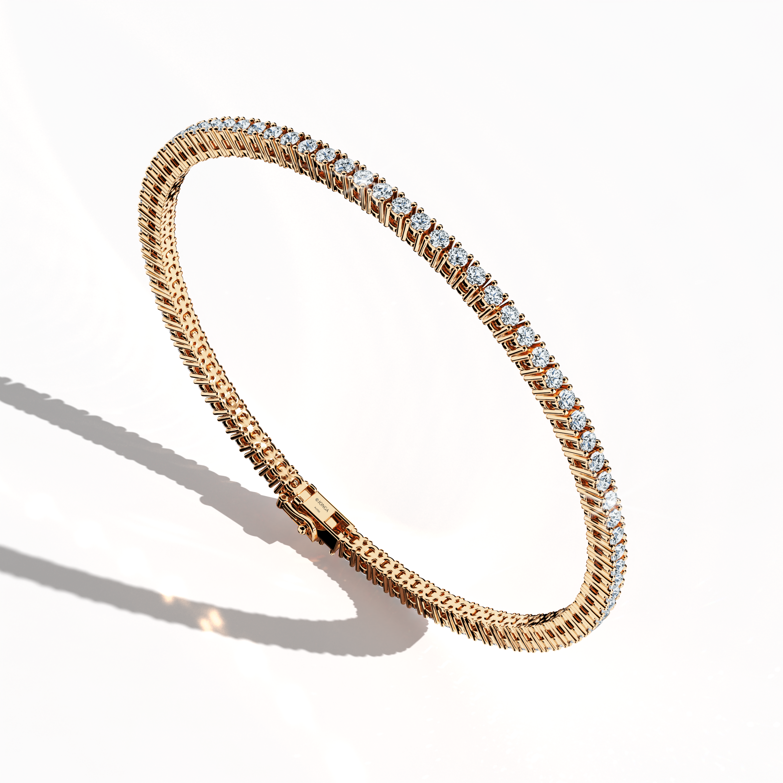 In a standing front top side view, this 3 carat diamond tennis bracelet in розовое золото (also referred to as pink gold or red gold) showcases prong-set round brilliant stones with a graceful curvature. Known as tennis bracelet, line bracelet, eternity bracelet, river bracelet, or inline bracelet, the four-prong setting accentuates each diamond’s fire. A versatile choice for elegant style. Keywords: diamond tennis bracelet, 3 carat, розовое золото, Украшения, prong setting.