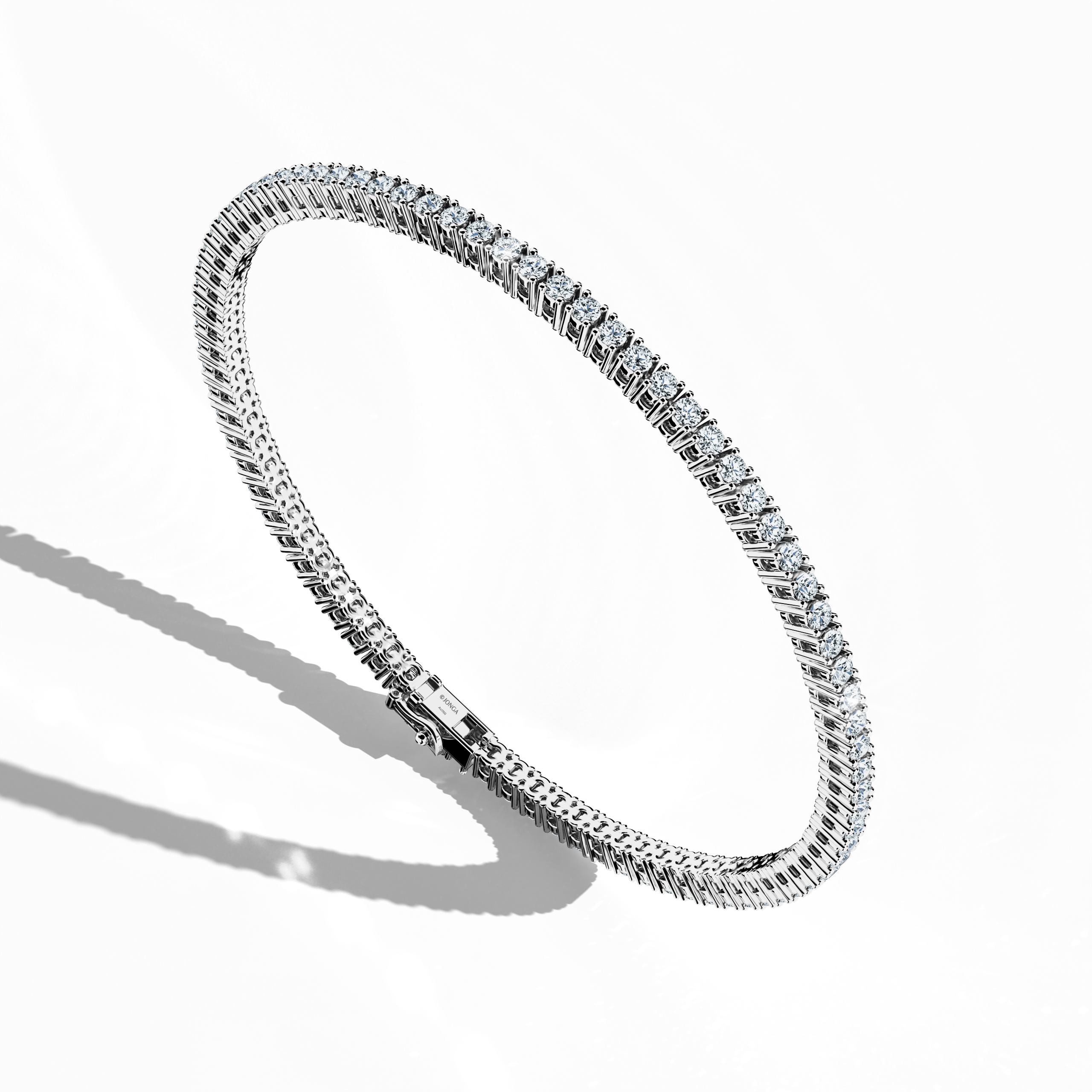 In a standing front top side view, this 3 carat diamond tennis bracelet in белое золото (also referred to as grey gold or palladium gold) showcases prong-set round brilliant stones with a graceful curvature. Known as tennis bracelet, line bracelet, eternity bracelet, river bracelet, or inline bracelet, the four-prong setting accentuates each diamond’s fire. A versatile choice for elegant style. Keywords: diamond tennis bracelet, 3 carat, белое золото, Украшения, prong setting.