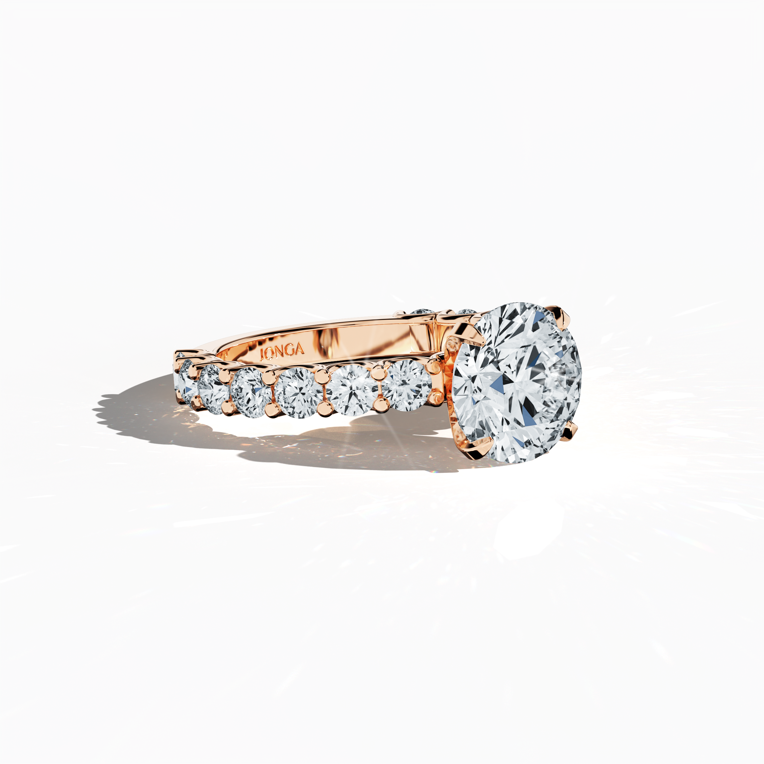 Side profile of a розовое золото solitaire Eternity ring with a stunning 3 карат center/centre diamond and 1.60 карат side diamonds, all set securely in a four-nail prong setting. This elegant side view emphasizes the sleek design and sparkling diamonds, making it a coveted piece for engagements, weddings, or anniversaries. Keywords: розовое золото, solitaire, diamond eternity band, luxury ring, wedding band, fine Ювелирные изделия, 4.60 карат, elegant side view.