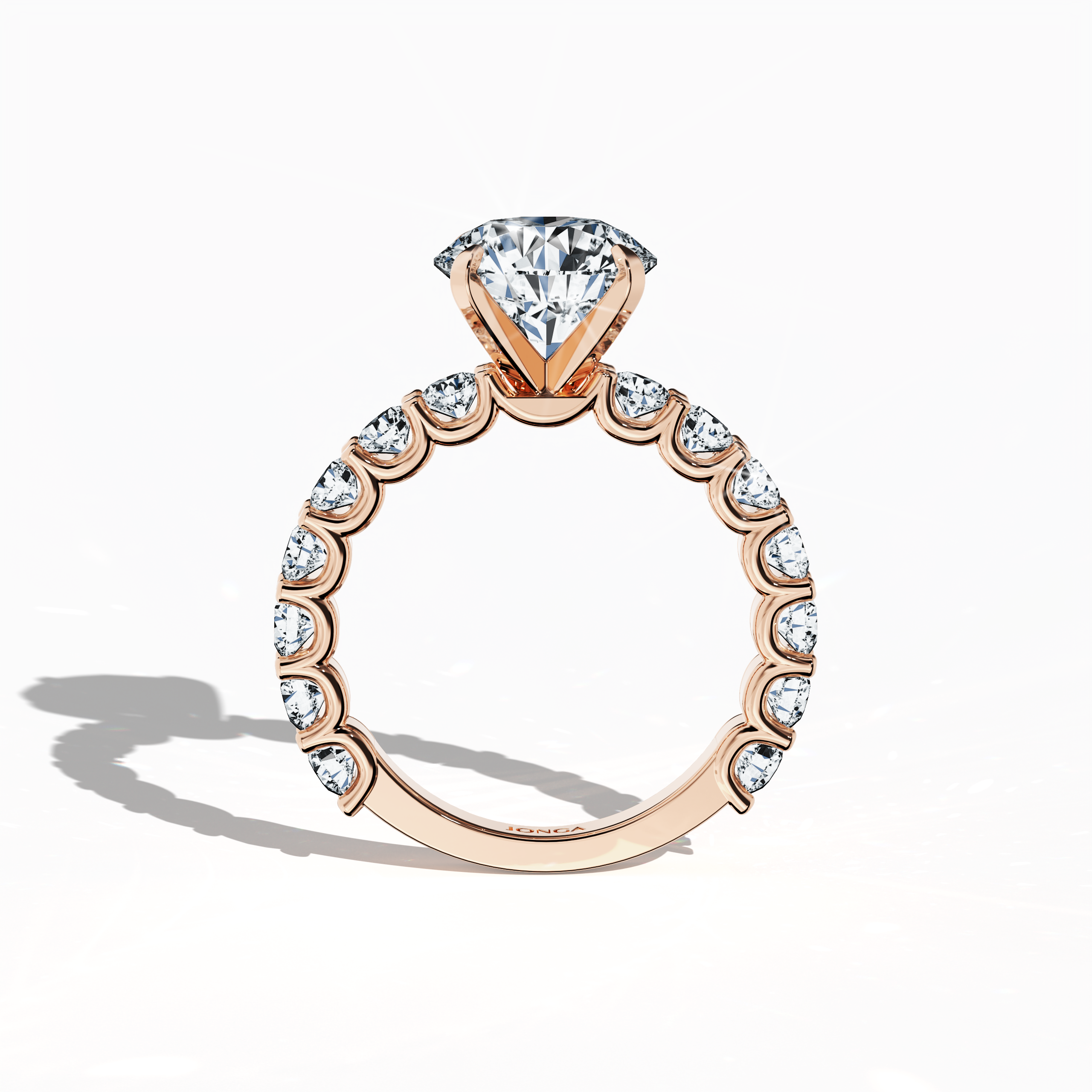 Standing front view of a розовое золото solitaire Eternity ring, featuring a radiant 3 карат center/centre diamond and 1.60 карат side diamonds in a four-nail prong setting. This luxurious piece, ideal as an engagement ring or wedding band, embodies the timeless beauty of fine Украшения/fine Ювелирные изделия. A true masterpiece for special occasions. Keywords: розовое золото, diamond eternity band, solitaire ring, wedding Украшения/Ювелирные изделия, bridal, 4.60 карат, luxury diamond ring.