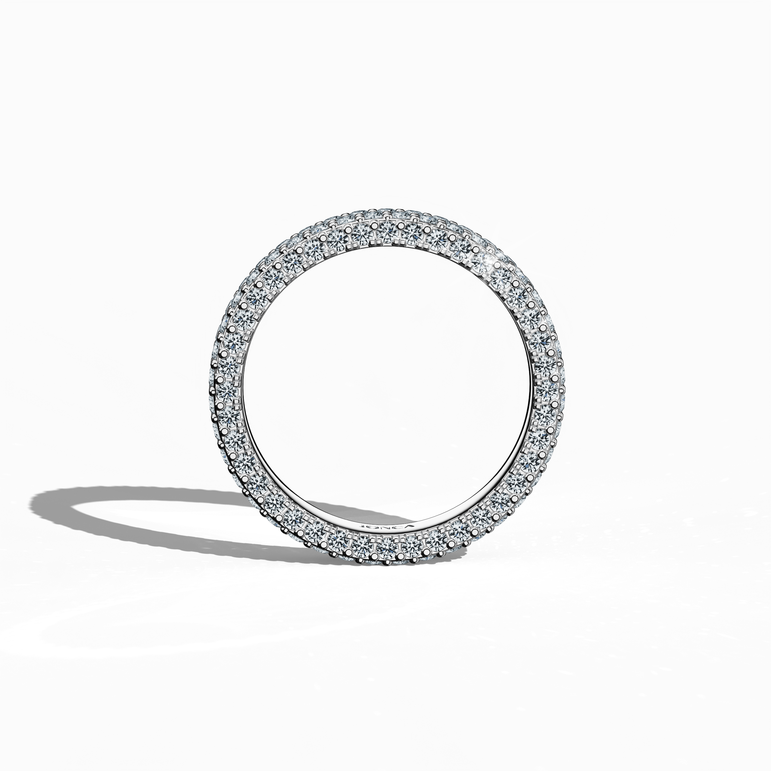 Impressive белое золото 4-row diamond band captured in a standing front view, highlighting up to 2.10 carats of expertly set micro diamonds. This sophisticated design, also celebrated as an eternity band, classic pave band, multi-row diamond band, and luxury diamond band in various markets, presents a radiant icy gold surface with delicate engravings and balanced form. The image reflects modern luxury and timeless allure. Keywords: белое золото, micro diamonds, elegance, luxury.