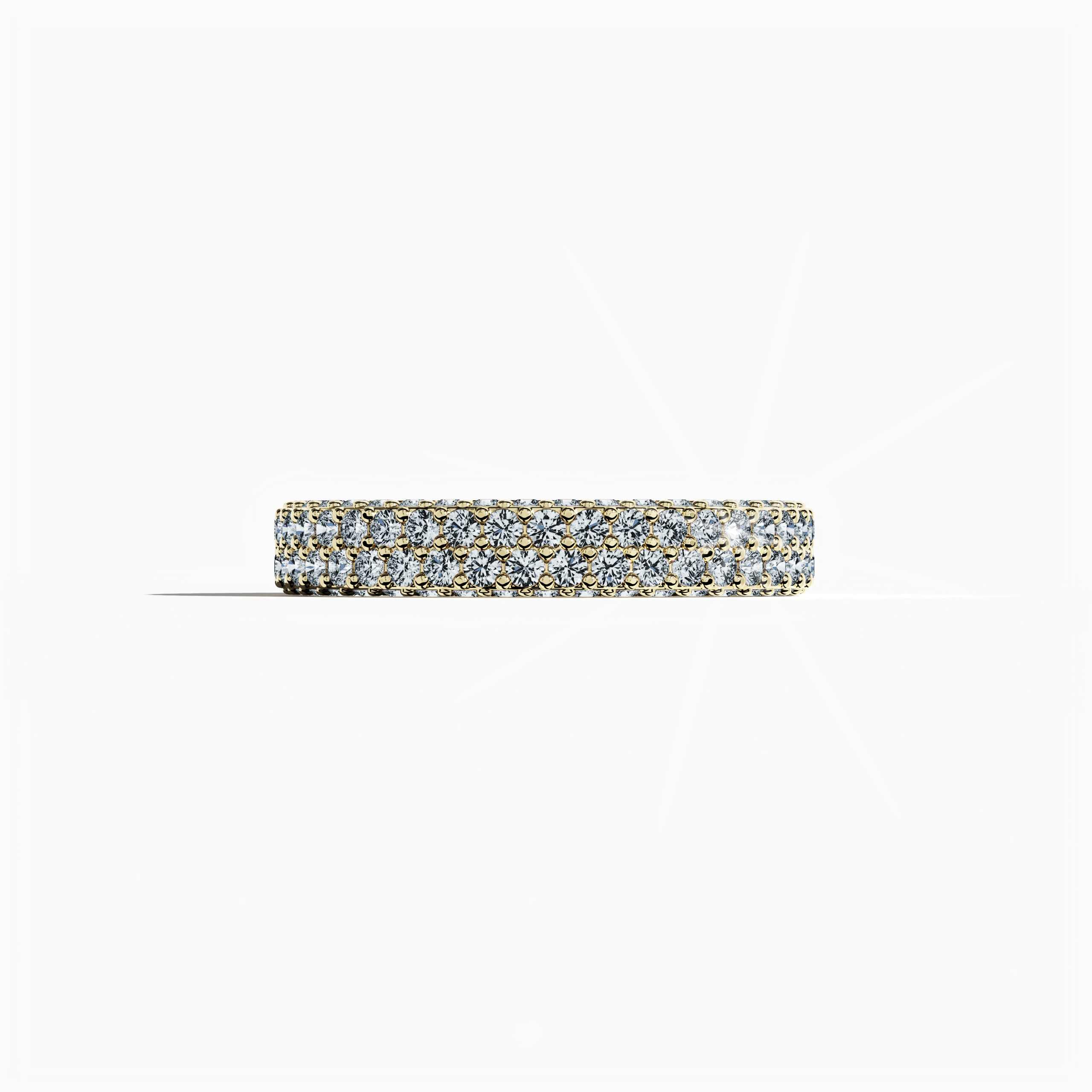 Exquisite жёлтое золото 4-row diamond band in a sleeping front view, featuring up to 2.10 carats of meticulously arranged micro diamonds. This remarkable design, known globally as an eternity band, classic pave band, multi-row diamond band, and luxury diamond band, boasts a radiant sun-kissed gold finish with detailed engravings and balanced contours. The image captures vibrant reflections and exceptional craftsmanship, symbolizing modern luxury and timeless allure. Keywords: жёлтое золото, micro diamonds.