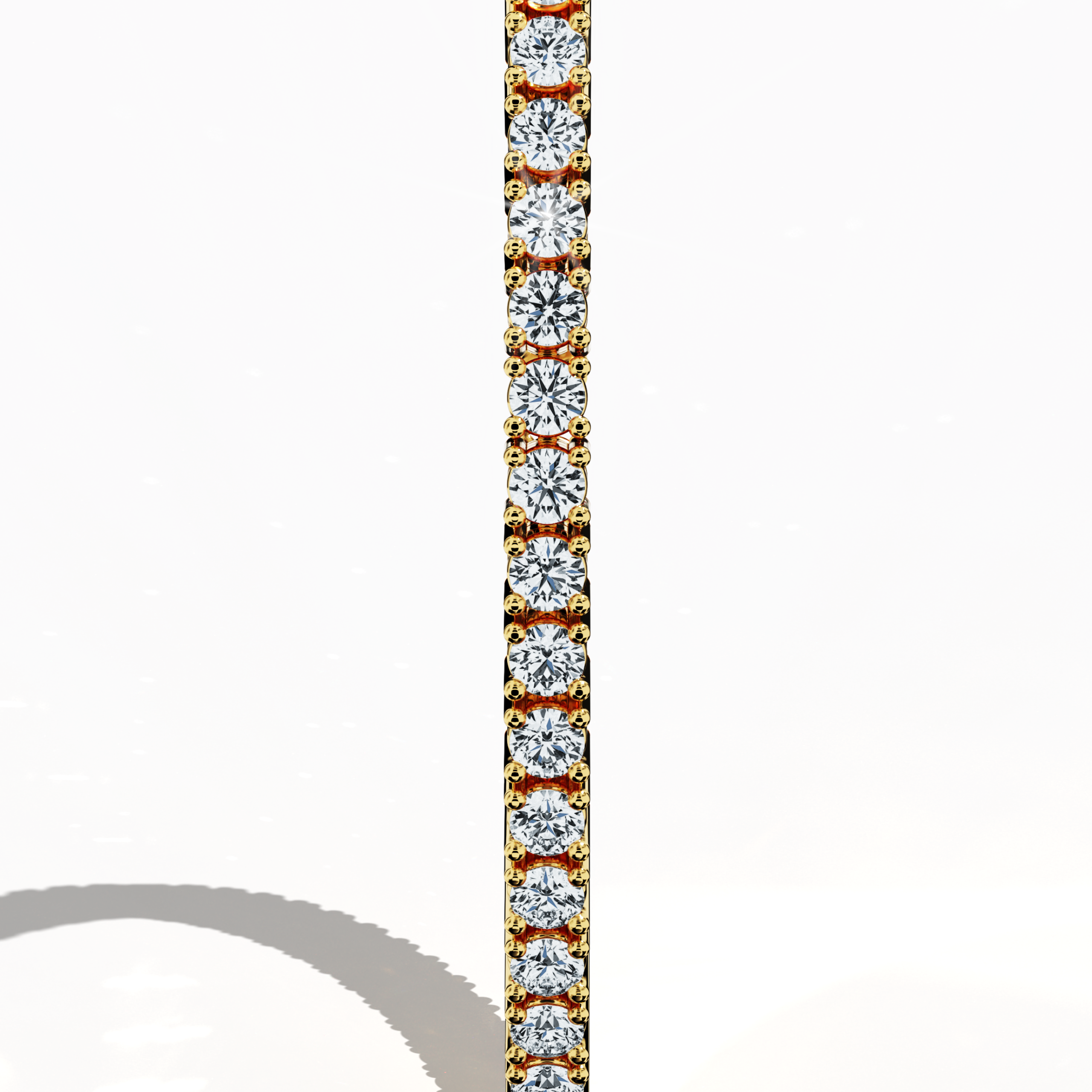 In a standing side view, this 4 carat diamond tennis bracelet in yellow gold (alternatively called classic gold or champagne gold) reveals a sleek profile formed by a seamless row of prong-set round brilliant diamonds. Known as a tennis bracelet, line bracelet, eternity bracelet, river bracelet, or inline bracelet, its elegant four‐prong design accentuates each diamond’s natural brilliance, perfect for upscale events and sophisticated everyday fashion. Keywords: diamond tennis bracelet, 4 carat, yellow gold