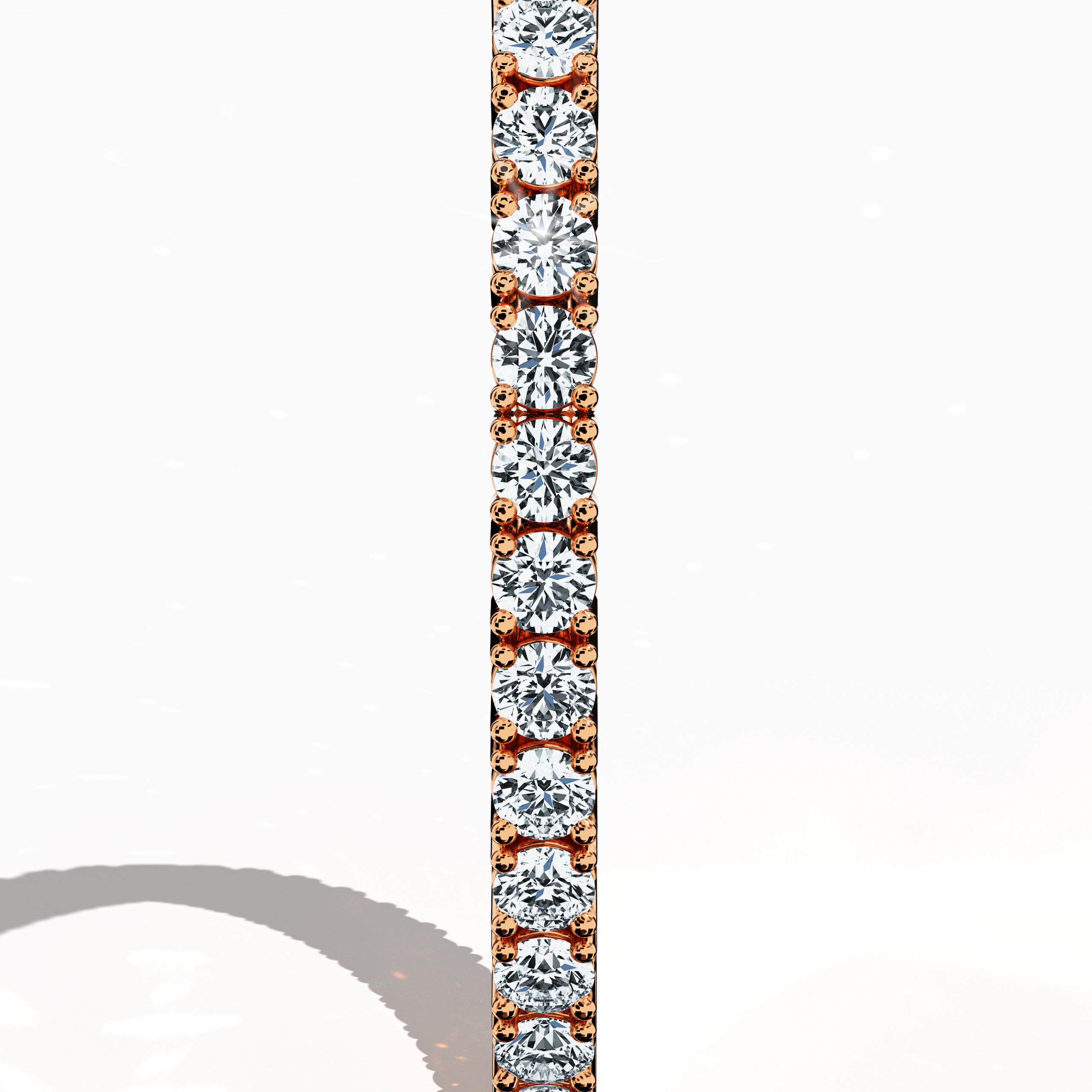 Exhibited from a standing side view, this 8-carat diamond tennis bracelet in розовое золото (alternatively known as pink gold or red gold) highlights a seamless row of prong-set round diamonds. Also referred to as a line bracelet, eternity bracelet, river bracelet, or inline bracelet, its design exudes modern elegance and a soft, romantic glow. Perfect for transitioning between casual and formal occasions, it stands as a symbol of refined sophistication. Keywords: diamond tennis bracelet, розовое золото.