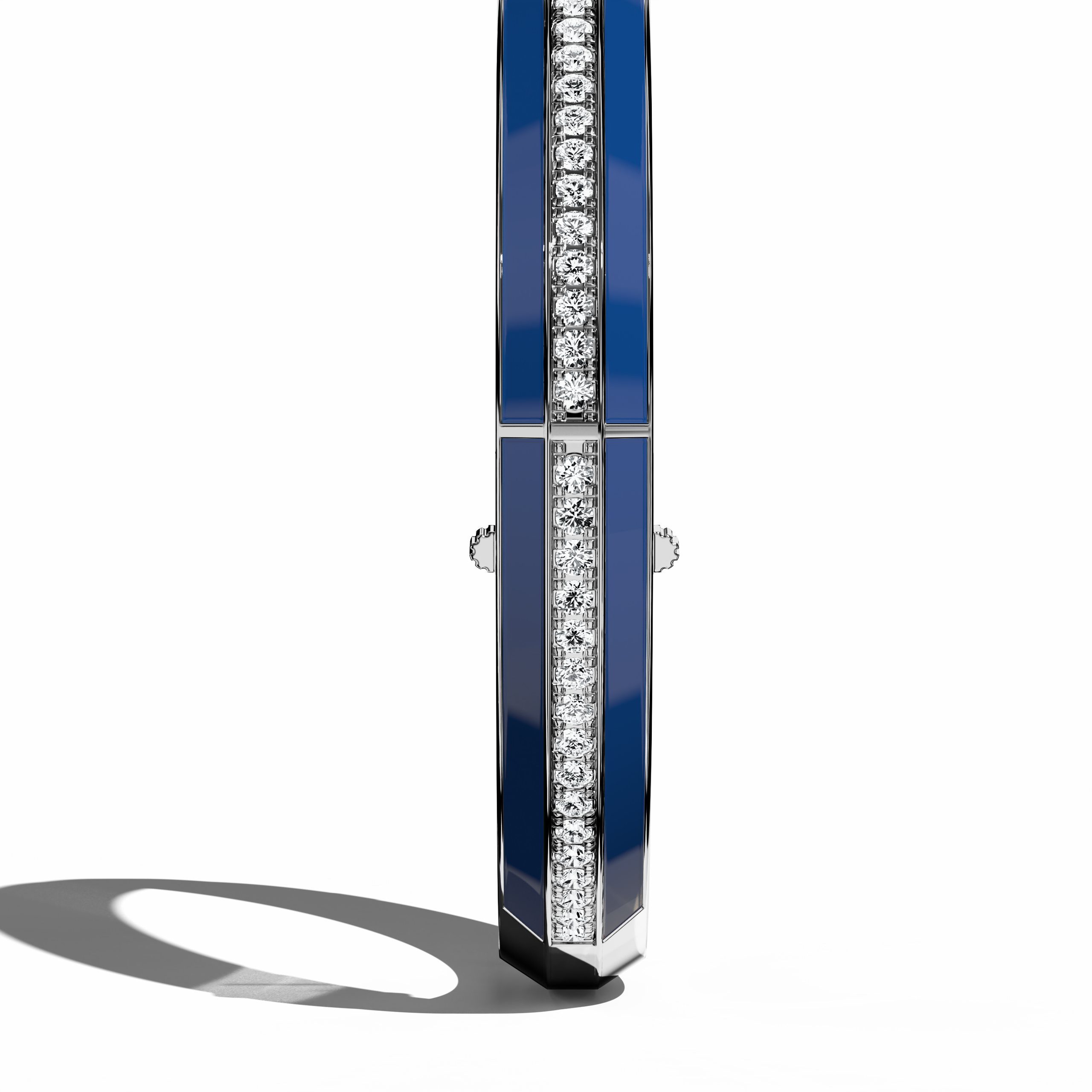 Standing side view of a side enamel center paved bangle in белое золото (also known as pale gold), showcasing a bold blue enamel panel. Sparkling with 2.60 carats of diamonds in a pavé layout, this statement piece—termed bracelet, armlet, kangan, or pulsera—embodies a harmonious fusion of modern styling and classic refinement. The profile accentuates its slender shape. Keywords: bangle, enamel, diamonds, белое золото.