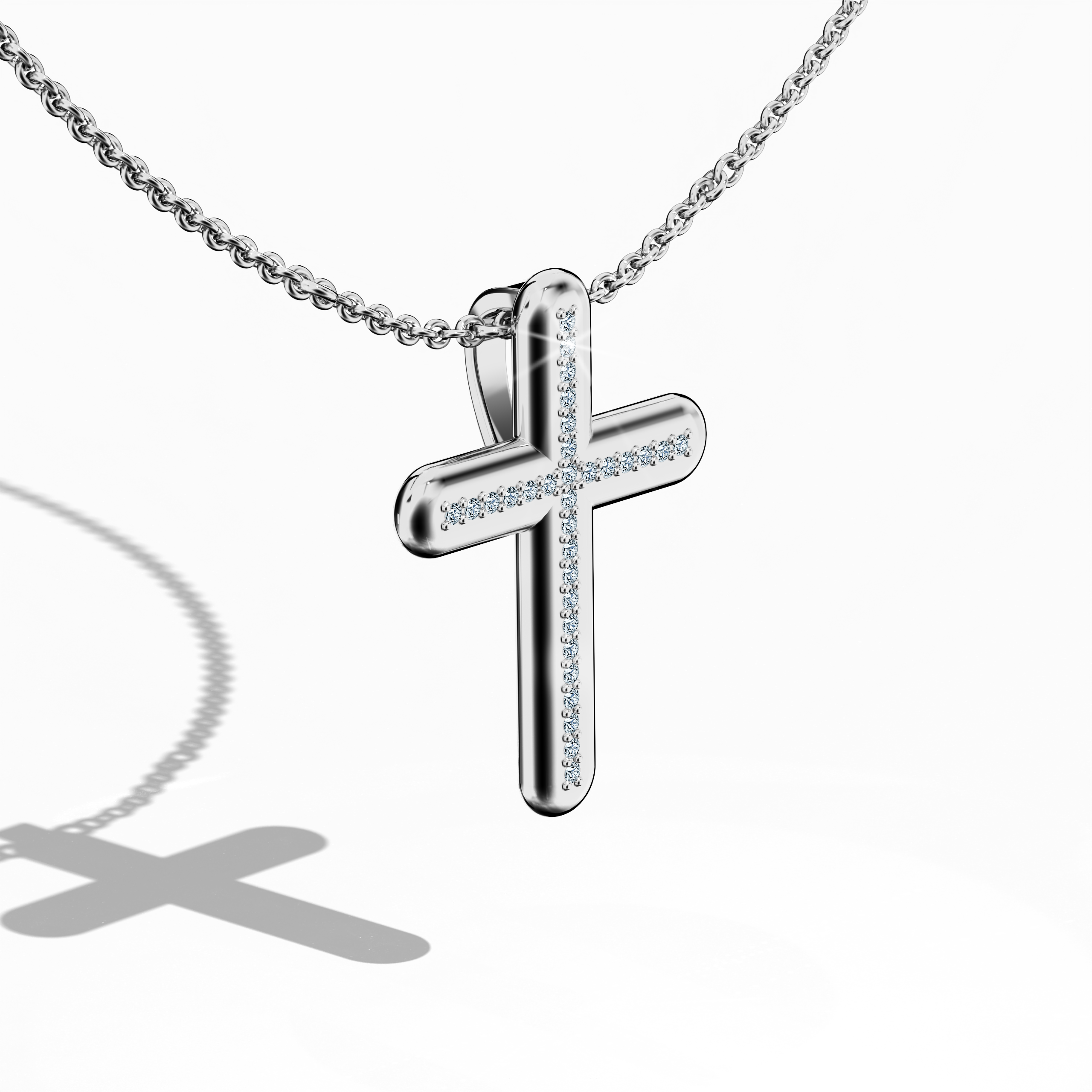 Front top side view of a center paved cross pendant in radiant белое золото, occasionally referred to as pale or silver-toned metal. Displaying 0.20 carat of pavé diamonds at its core, this piece is also known as a diamond pavé cross or shimmering cross. From this angled perspective, its smooth edges and balanced proportions reflect meticulous craftsmanship, merging faith-inspired symbolism with modern style.
Keywords: center paved cross, белое золото, diamond pavé, modern accessory.