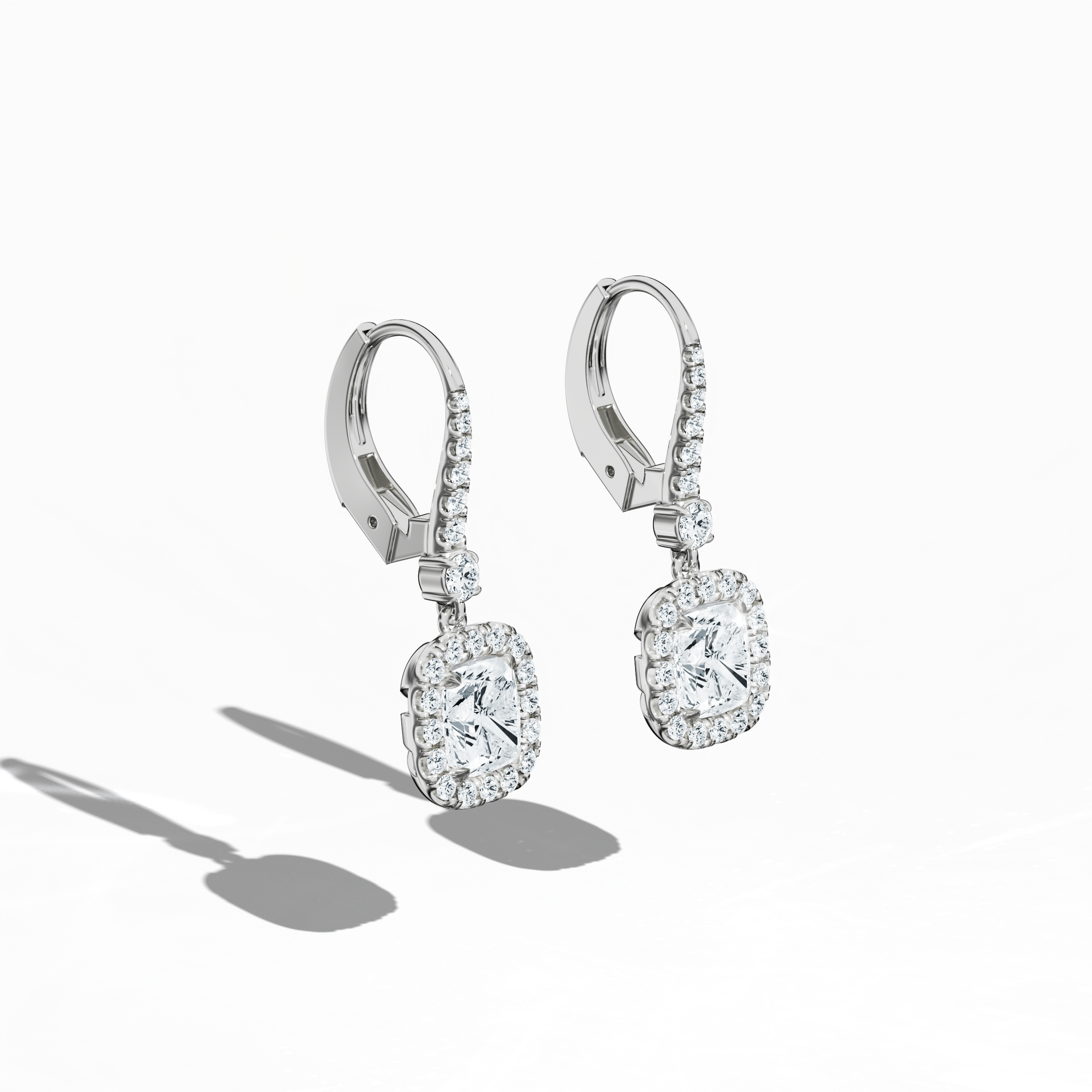 Cushion Halo Earring showing 1.00 carat cushion cut diamonds with halo setting by Jonga 18K white gold