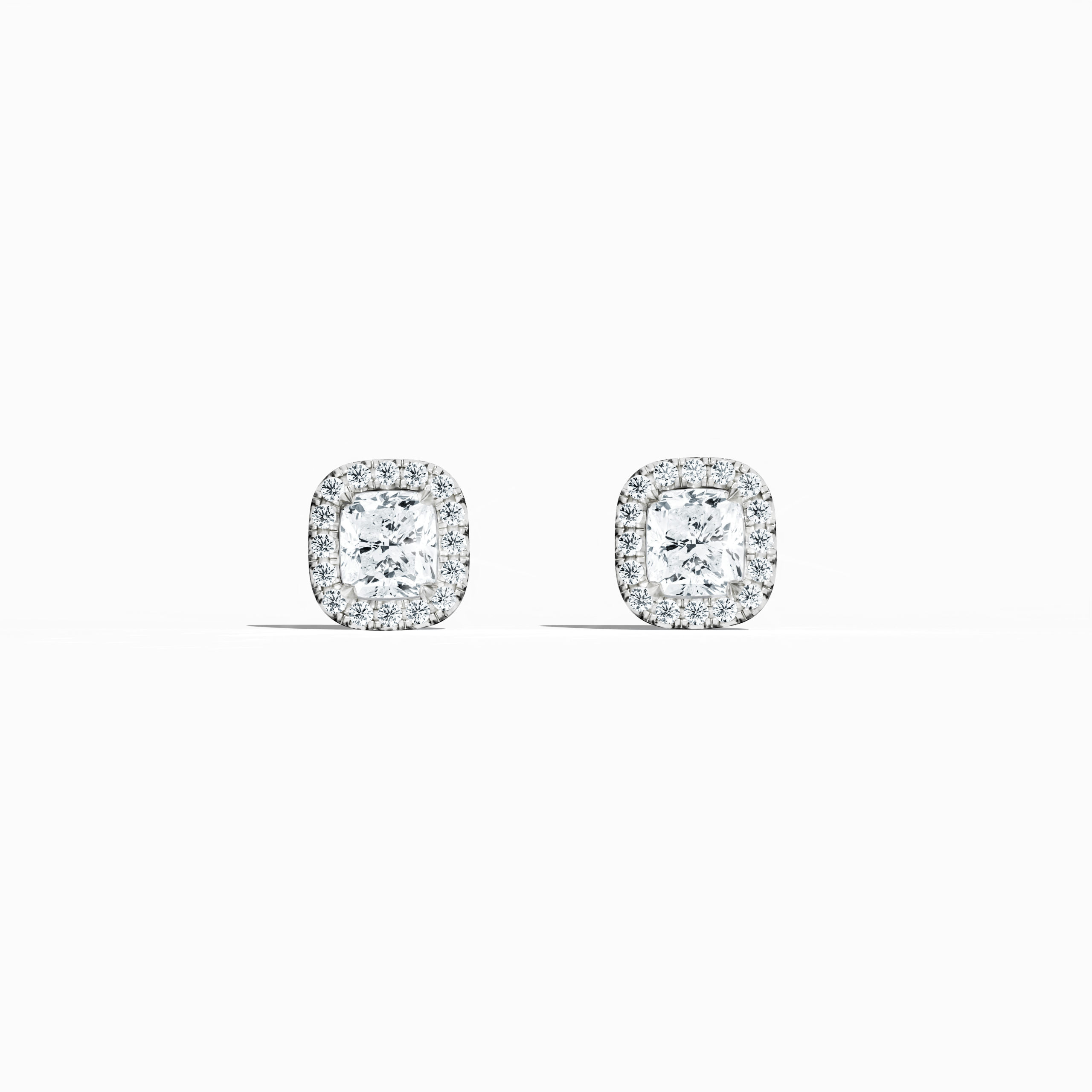 Cushion Halo Stud in white Gold 2.47 carat total 1.00 carat each GIA certified D-F color VVS-VS clarity Dubai