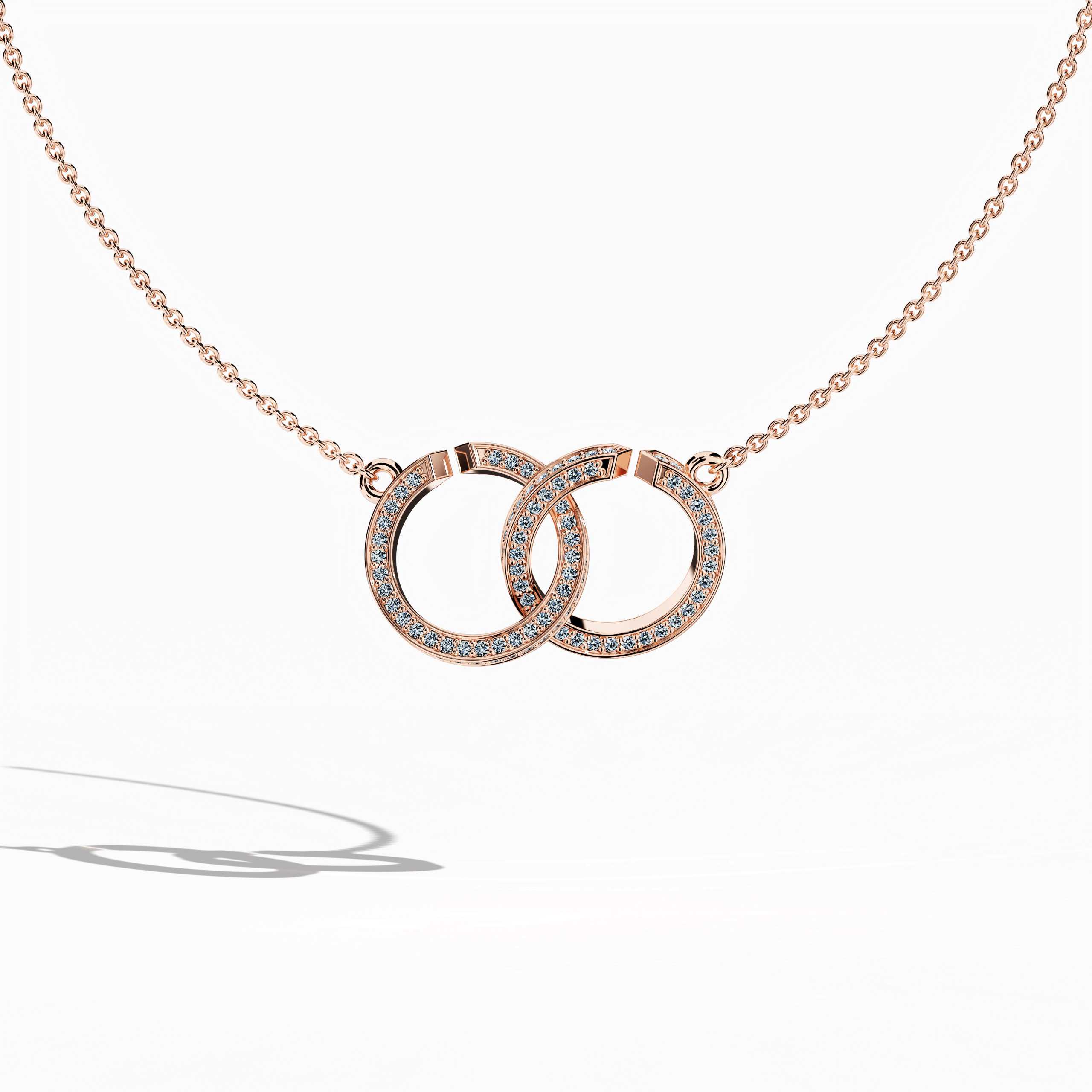 Front view of an interlock diamond pendant in розовое золото (oro rosa, or rose, Roségold), showcasing an elegant interlocking design set with up to 0.90 carats of scintillating diamonds. This striking Украшения piece, also known as an interlock pendant, diamond interlock necklace, or locked diamond pendant, seamlessly marries contemporary style with romantic allure. Its interlaced structure and lustrous finish emphasize refined craftsmanship and modern sophistication. Keywords: interlock diamond pendant.