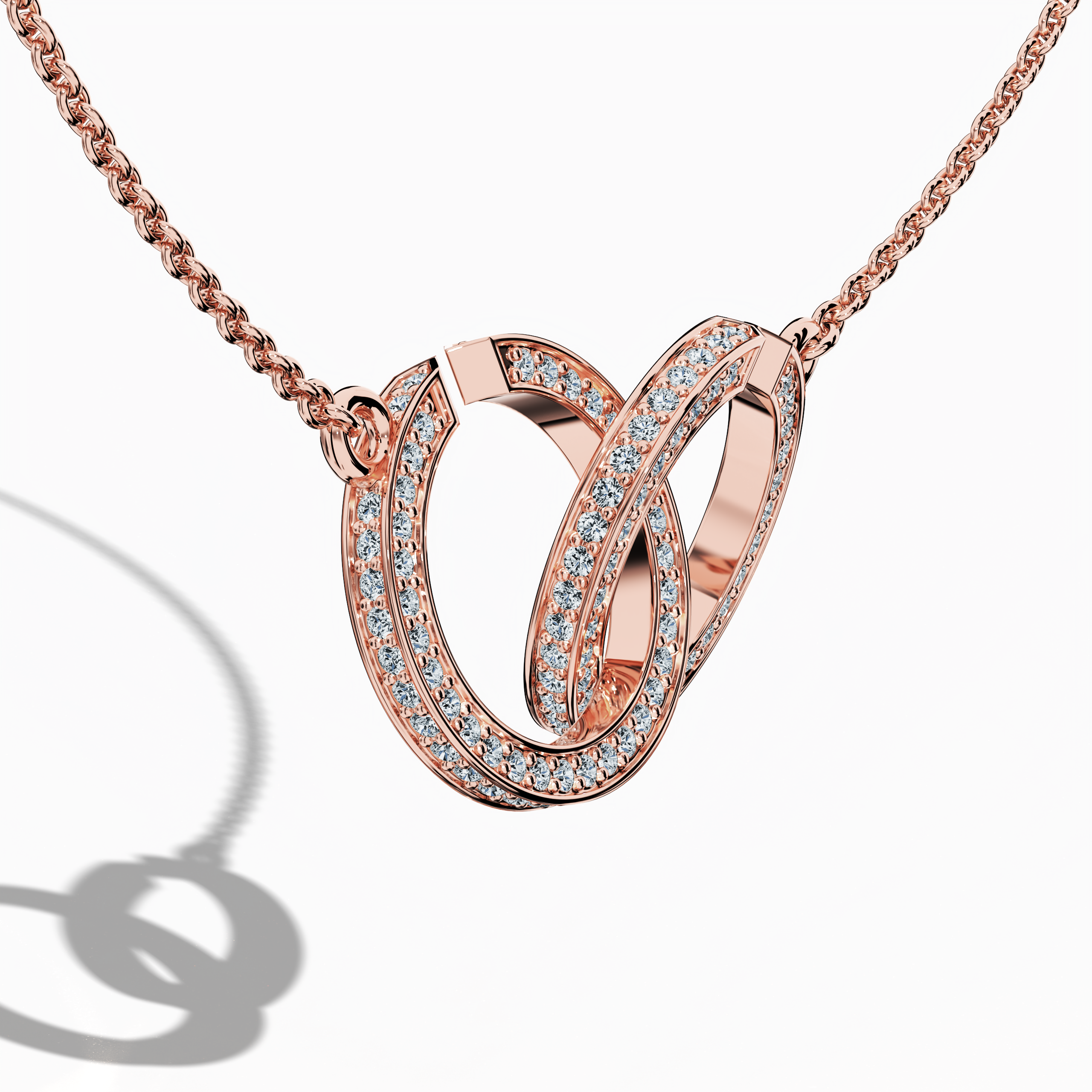 Close-up front side view of an interlock diamond pendant in rose gold (oro rosa, or rose, Roségold), emphasizing its meticulously interlocked design and up to 0.90 carats of glittering diamonds. This refined jewelry piece, also termed an interlock pendant, diamond interlock necklace, or locked diamond pendant, reveals the precision of every interlaced segment and a lustrous finish that epitomizes modern sophistication and enduring elegance. Keywords: interlock diamond pendant, rose gold, diamond jewelry.