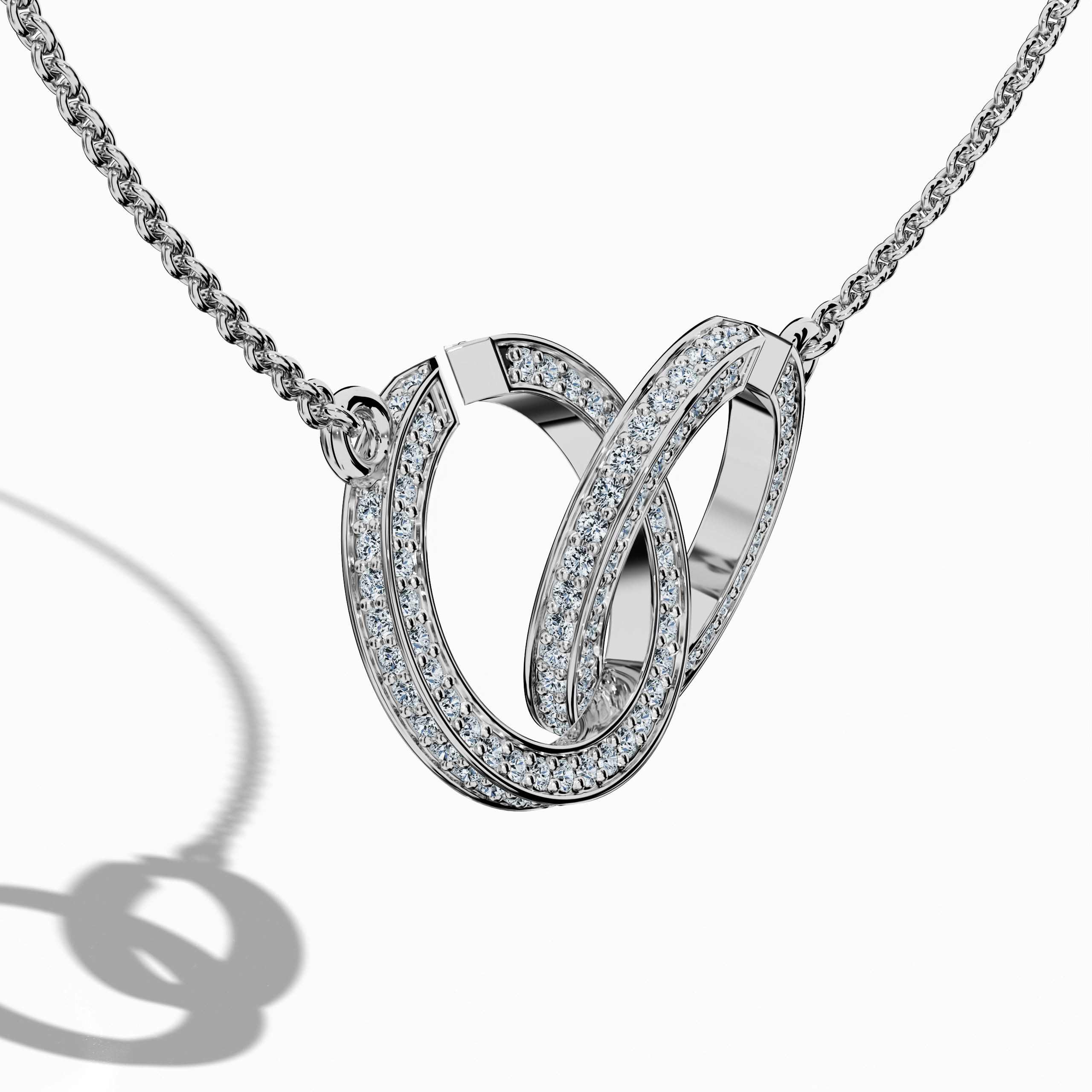 Close-up front side view of an interlock бриллиант кулон in белое золото (oro blanco, or blanc, Weißgold), highlighting its detailed interlocking design and up to 0.90 carats of dazzling бриллианты. This finely crafted jewelry piece—also called an interlock кулон, бриллиант interlock колье, or locked бриллиант кулон—reveals each interlaced segment’s precision and a polished surface that exudes modern luxury and timeless appeal. Keywords: interlock бриллиант кулон, белое золото, бриллиант jewelry, jewellery.