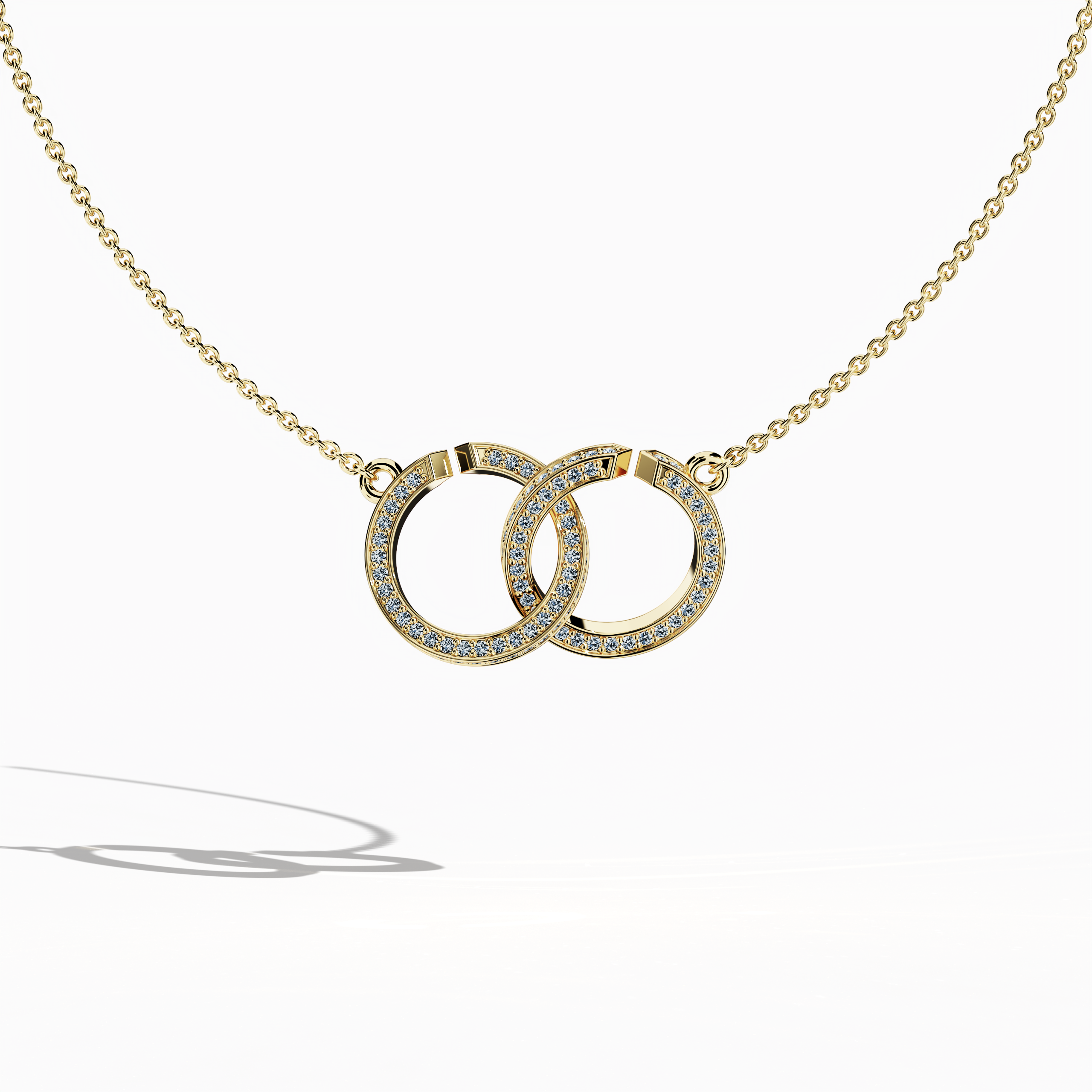 Front view of an interlock diamond pendant in yellow gold (oro amarillo, or jaune, Gelbgold), highlighting a dynamic interlocking design set with up to 0.90 carats of brilliant diamonds. This luxurious jewelry piece, known as an interlock pendant, diamond interlock necklace, or locked diamond pendant, fuses contemporary geometry with classic opulence. The interlaced motifs and radiant finish exude warmth and sophistication, ideal for elevating any ensemble. Keywords: interlock diamond pendant, yellow gold.