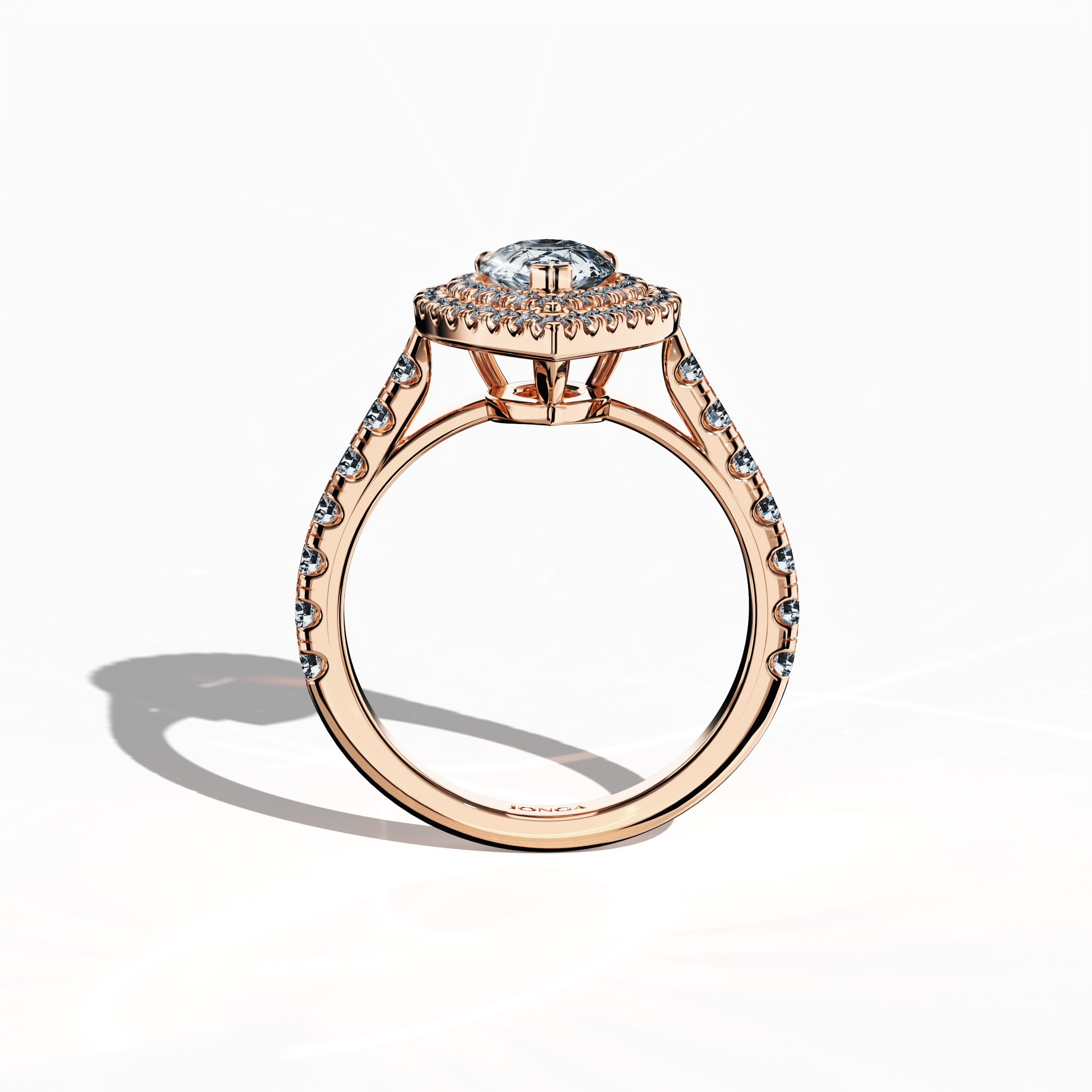 Visual presentation of a luxurious double halo diamond ring in captivating розовое золото (blush gold/romantic rose) captured in a standing front view. The ring centers on a mesmerizing 1ct pear‐cut diamond—also known as teardrop or waterdrop—complemented by up to 1ct of pave-set side diamonds. Featuring design styles such as double halo, pavé halo, twin halo, cathedral halo, vintage halo, and contemporary halo, the piece exudes opulence, refined craftsmanship, and a cosmopolitan aesthetic.