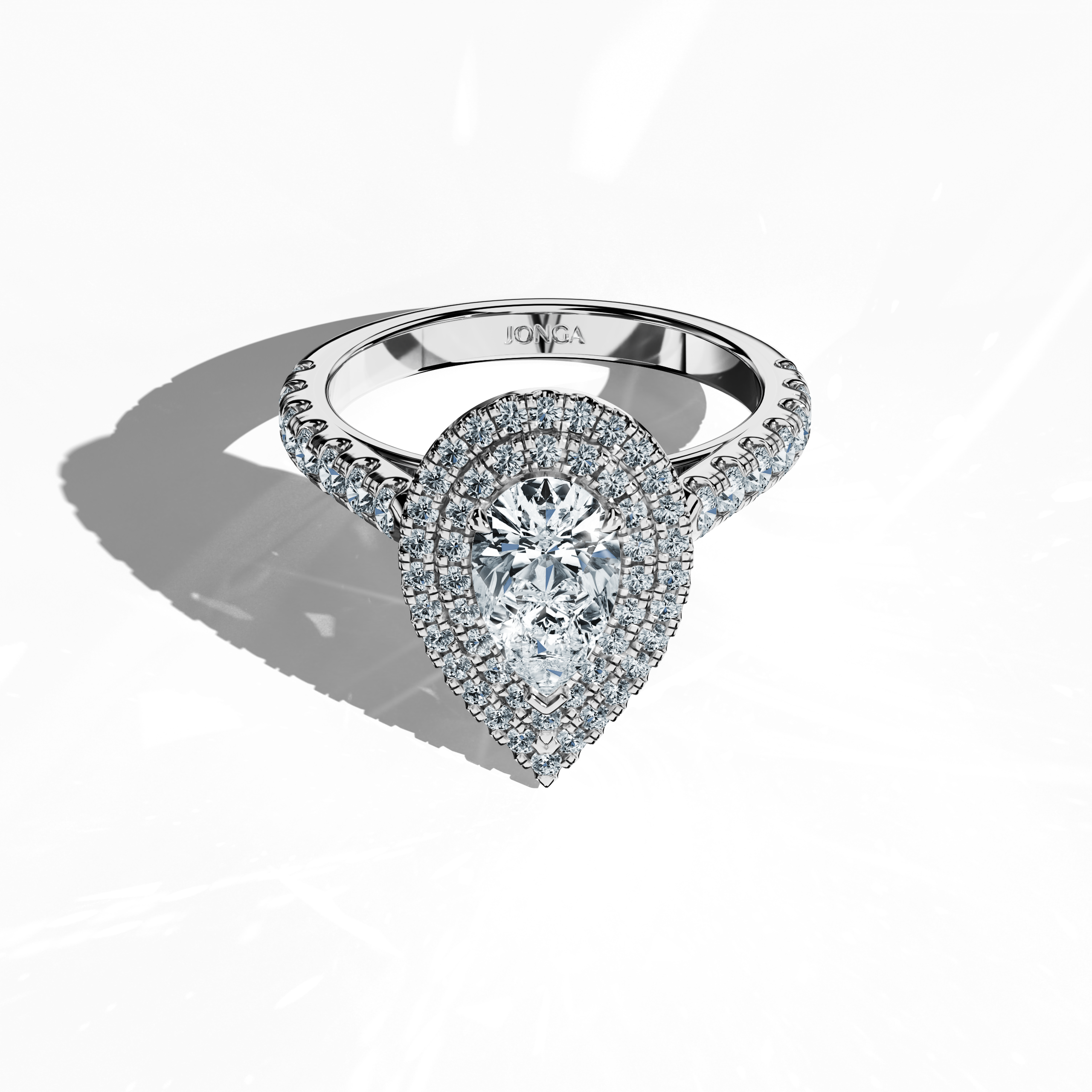 Photograph showcasing an exquisite double halo diamond ring in luminous белое золото (sterling white) from a sleeping front top view. The piece presents a brilliant 1ct pear‐cut center diamond (teardrop, waterdrop) encircled by up to 1ct of sparkling side diamonds set in a precise pave. Incorporating design motifs like double halo, pavé halo, twin halo, cathedral halo, vintage halo, and contemporary halo, the image radiates luxury, fine artistry, and global design appeal.