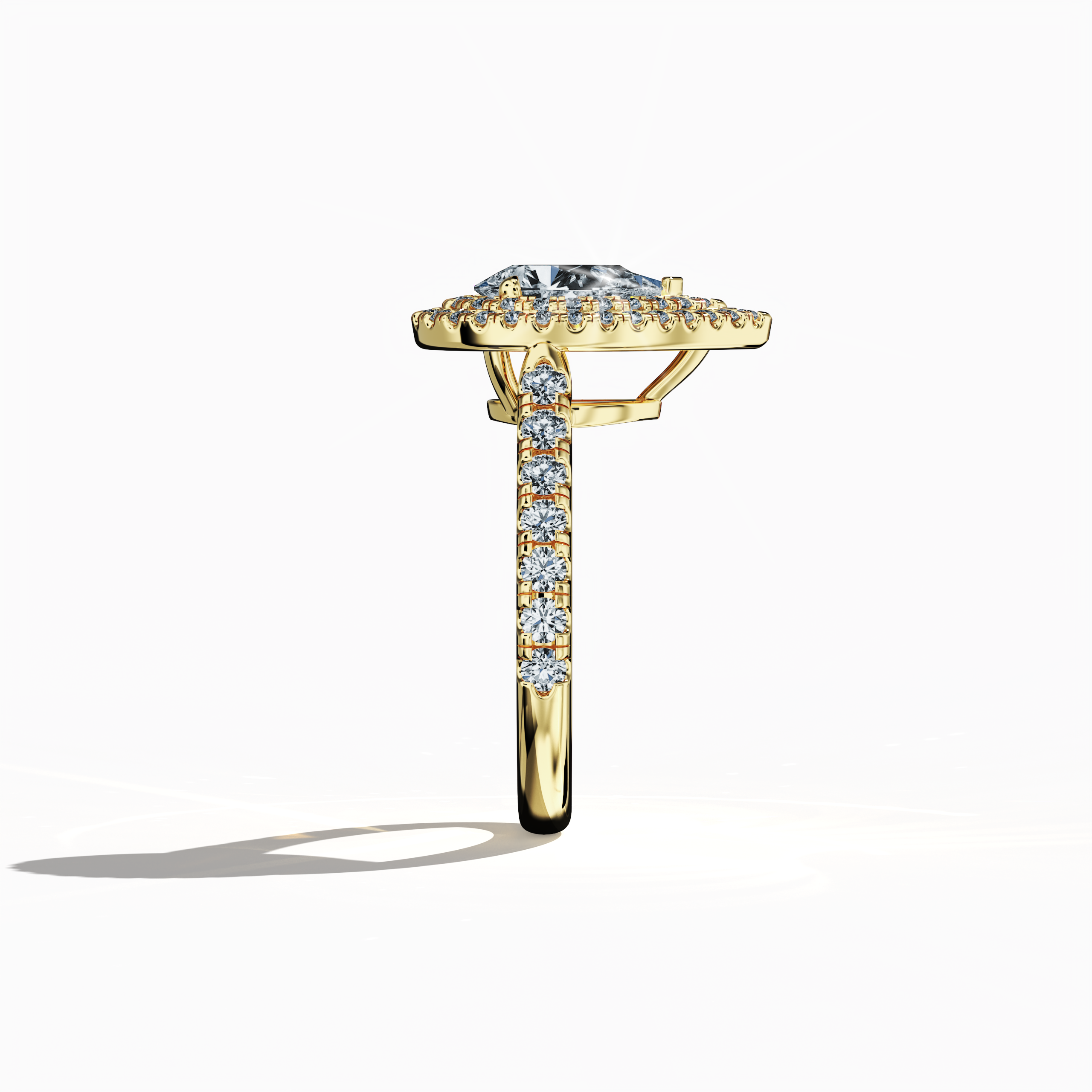 Detailed side view image of an elegant double halo diamond ring in radiant жёлтое золото (classic gold/sunlit gold). The ring’s profile showcases a 1ct pear‐cut center diamond—alternatively termed teardrop or waterdrop—flanked by up to 1ct of precisely paved side diamonds. Highlighting design variations such as double halo, pavé halo, twin halo, cathedral halo, vintage halo, and contemporary halo, this perspective emphasizes sleek contours, luxury detailing, and global design finesse.