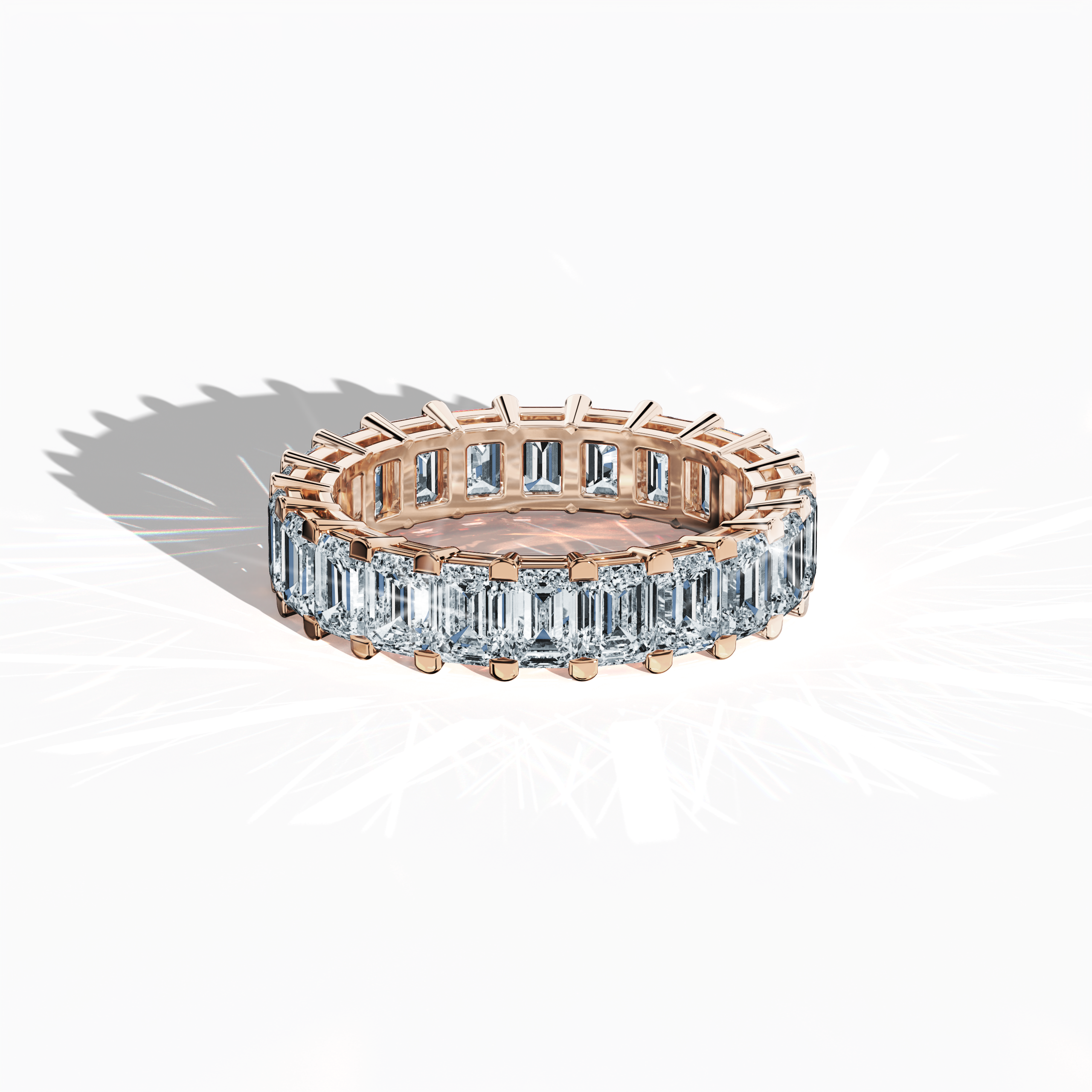 Displayed from an artful sleeping front top view, this captivating Emerald Eternity ring in alluring розовое золото—alternatively known as pink or blush gold—exemplifies modern luxury. Recognized by design titles like Eternal Emerald, Infinity Emerald, and Everlasting Allure, the ring is adorned with up to 24 exquisitely set diamonds weighing 4.55 carats that elegantly frame a vibrant emerald centerpiece. Keywords: fine Украшения, timeless elegance, innovation, superior craftsmanship.