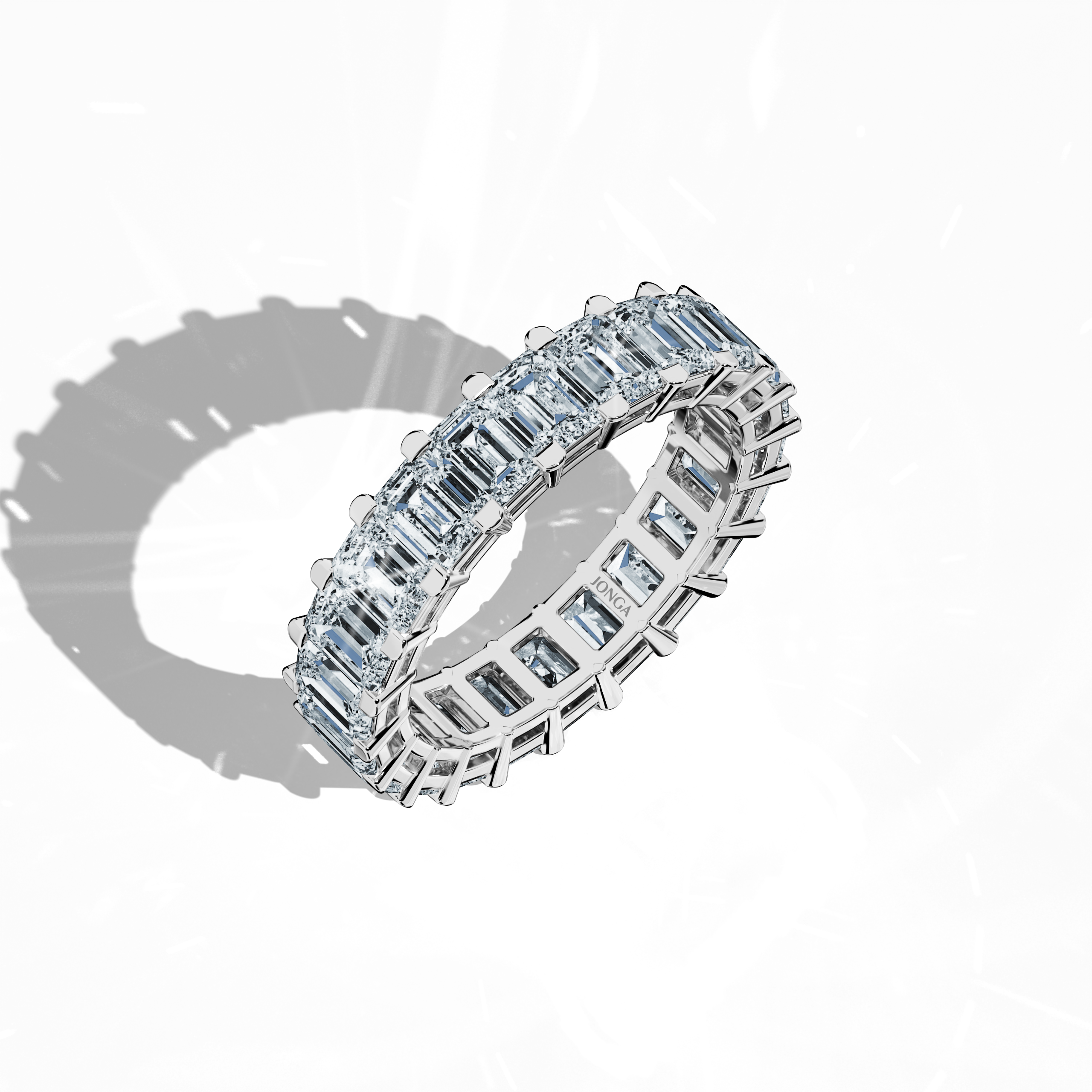 Exquisitely captured in a standing front top side view, this Emerald Eternity ring in luminous белое золото, also termed argent or платина-toned gold in varied design languages, showcases refined artistry. Celebrated as Eternal Emerald, Infinity Emerald, and Everlasting Allure, it features up to 24 dazzling diamonds totaling 4.55 carats encircling a vibrant emerald centerpiece, epitomizing luxury and timeless elegance. Keywords: innovative design, fine Украшения, meticulous craftsmanship.