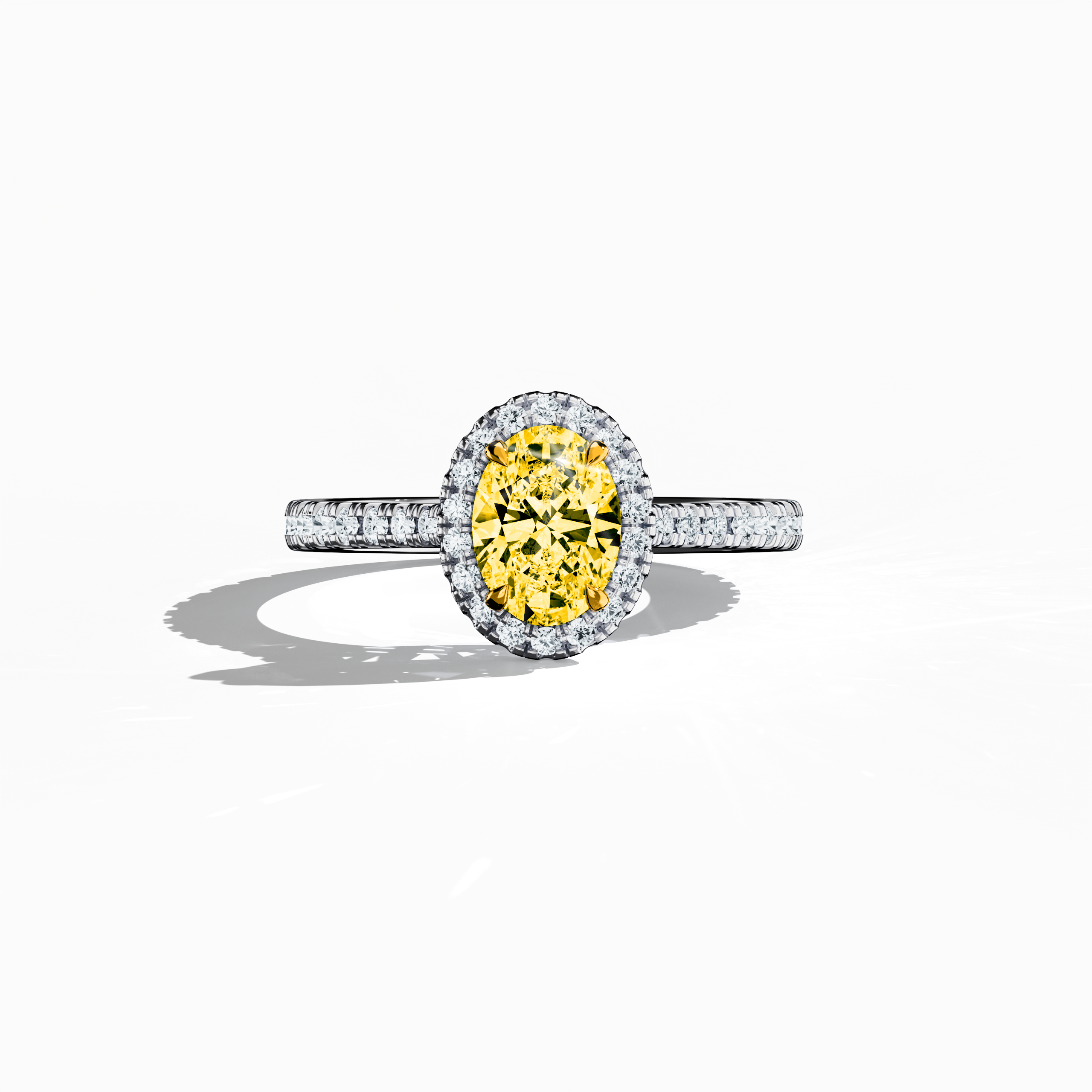 Captured in a serene sleeping front view, this halo paved ring in pristine белое золото showcases a luminous 1 carat yellow oval‐cut diamond centerpiece elegantly encircled by a 0.60 carat halo of brilliant side stones, totaling 1.60 carats. Merging Classic Halo, Modern Halo, Vintage Halo, Contemporary Halo, and Eternity Halo styles with oval and radiant cut influences, its frosted, платина‐like finish radiates refined luxury. Keywords: создано вручную, sparkle, elegance, timeless, sophisticated.