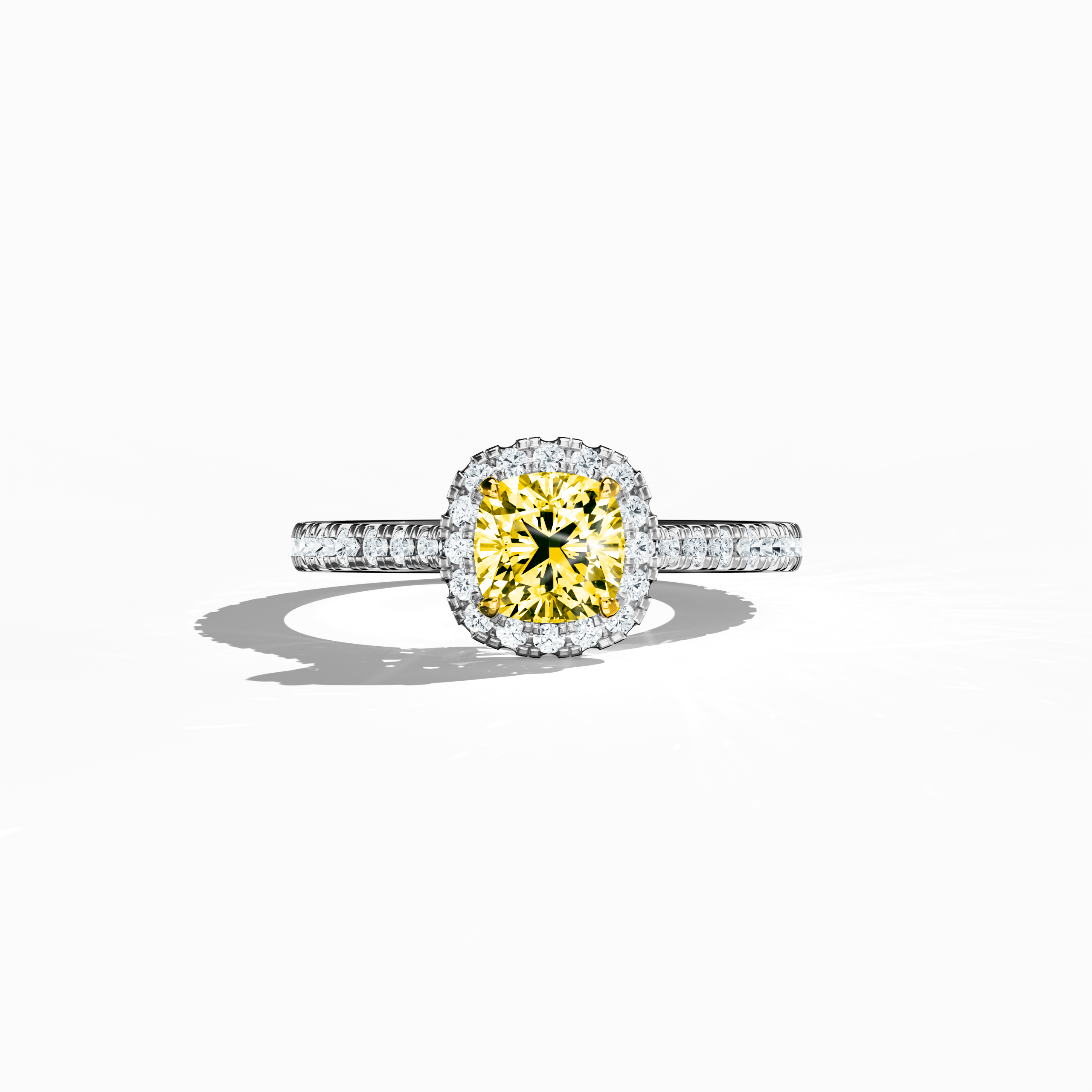 Captured in a serene sleeping front view, this halo paved кольцо in brilliant белое золото displays a radiant 1ct yellow кушон‐cut бриллиант centerpiece, elegantly framed by a 0.60ct halo of dazzling side stones for a total of 1.60 carats. The design blends Classic Halo, Modern Halo, Vintage Halo, Contemporary Halo, and Eternity Halo styles with influences from кушон and radiant cuts, along with alternate белое золото descriptors like icy and platinum-like. Keywords: luxury, handcrafted, sparkle, elegance.