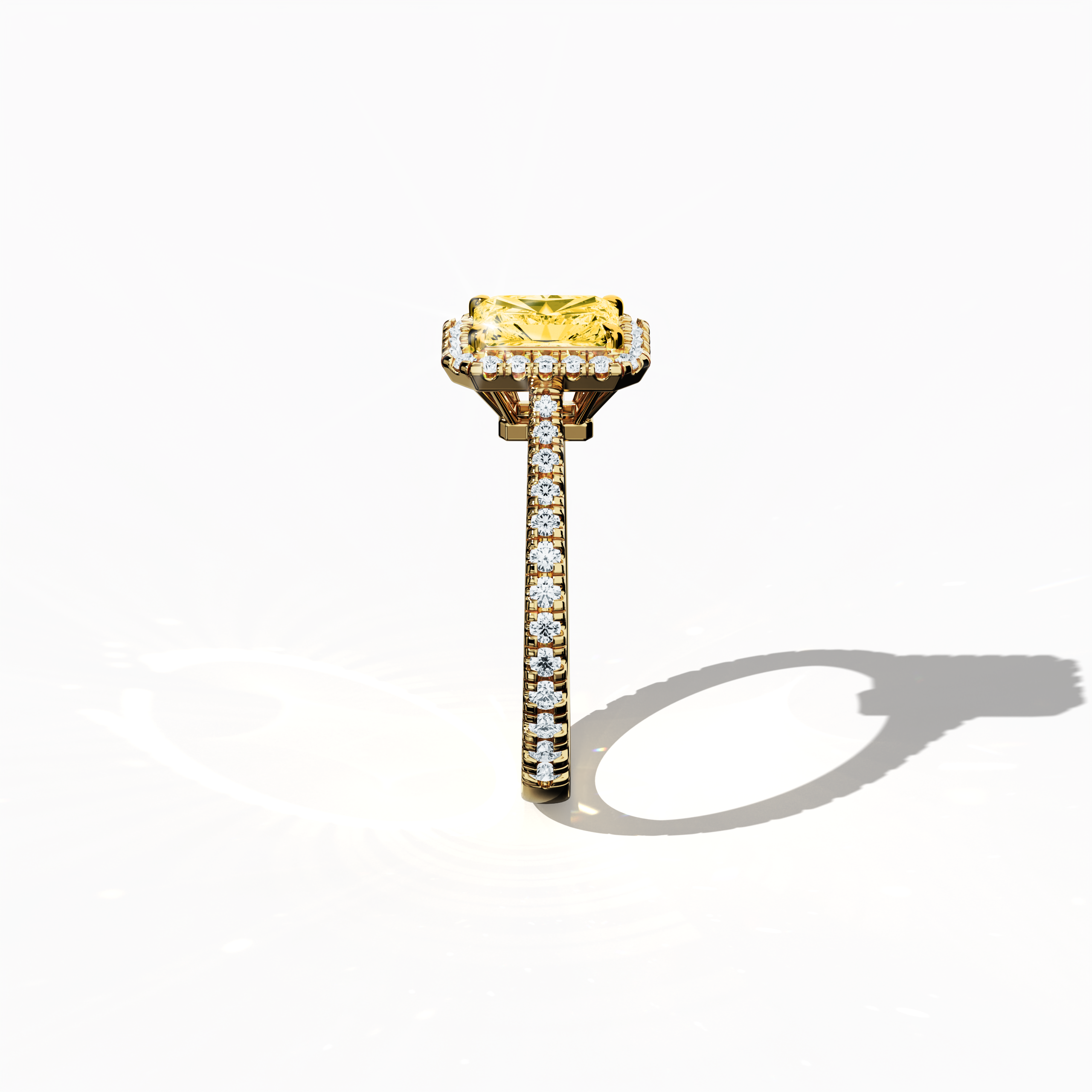 Captured in a detailed standing side view, this halo paved ring in opulent yellow gold highlights a dazzling 1 carat yellow radiant‐cut diamond center, set within a 0.60 carat halo of luminous side stones that add up to 1.60 carats of radiant sparkle. The design blends Classic Halo, Modern Halo, Vintage Halo, Contemporary Halo, and Eternity Halo motifs with influences of radiant, brilliant, and oval cuts, accentuated by a golden, amber, sunlit finish. Keywords: luxury, crafted, sparkle, refined, exquisite.