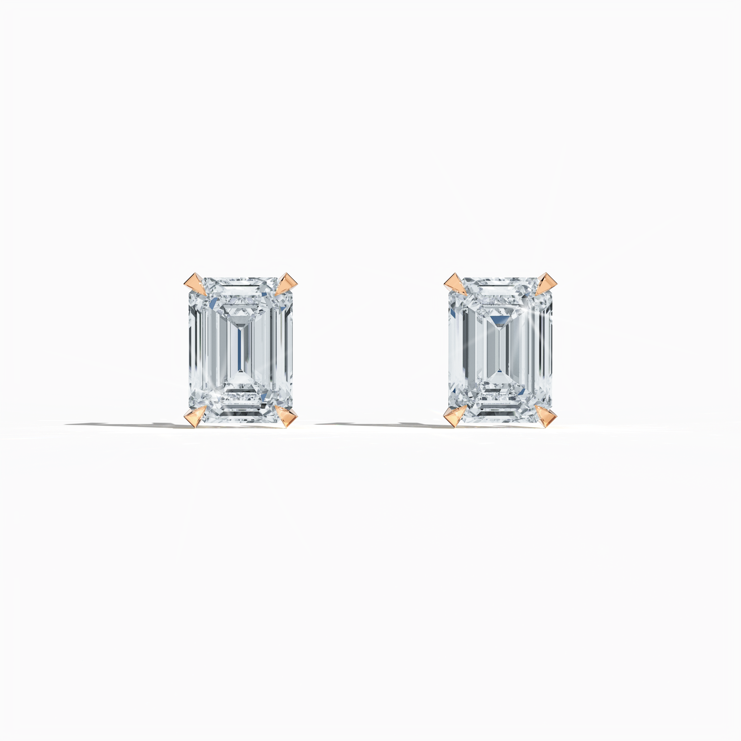 Front view of 1-carat natural emerald earring in 18k розовое золото with prong setting; emerald stud, 1ct natural emerald, luxury fine Украшения/fine Ювелирные изделия ear accessory.