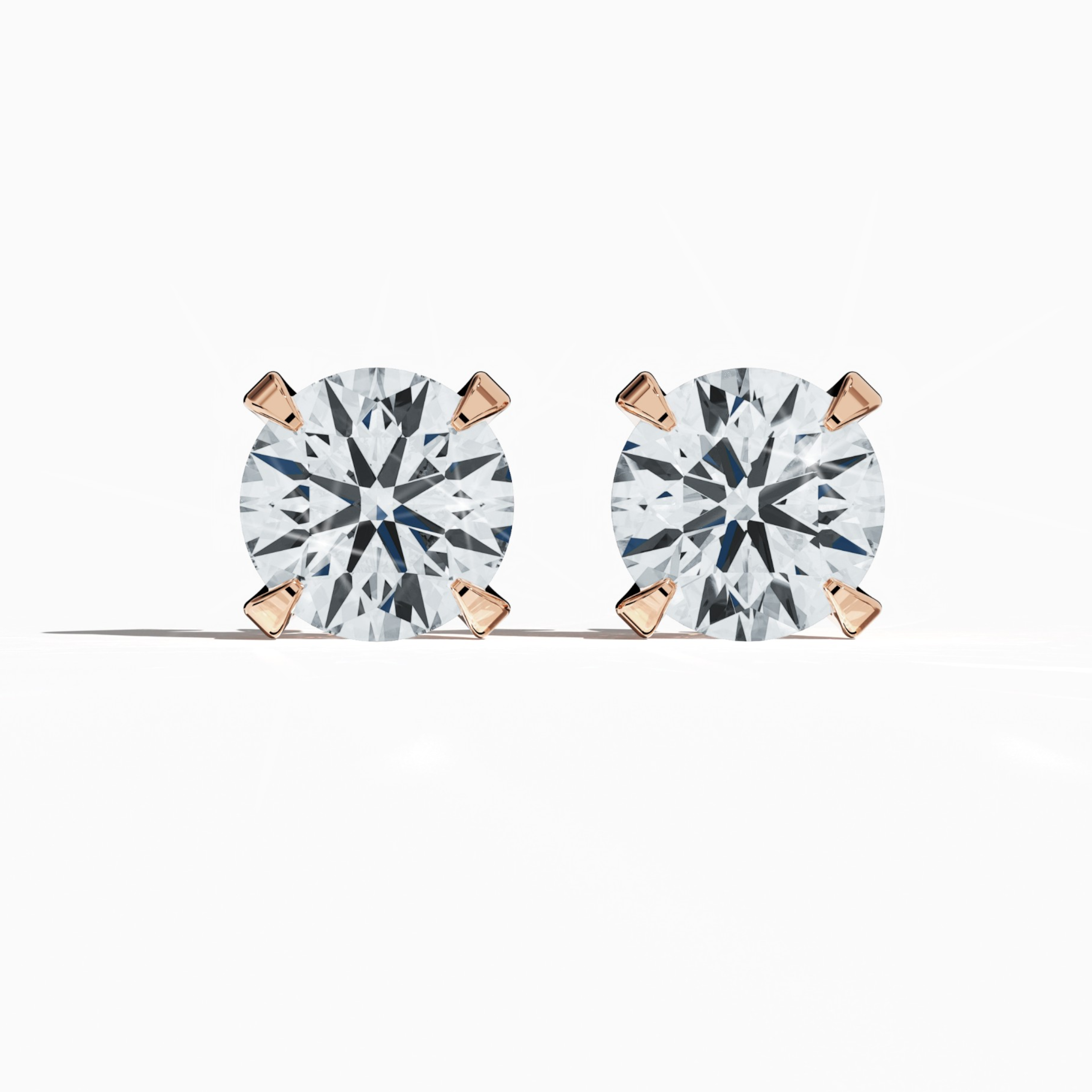 Front view of 6 carat natural diamond stud earrings in classic basket and Nail Prong/claw settings, crafted in 18k розовое золото.