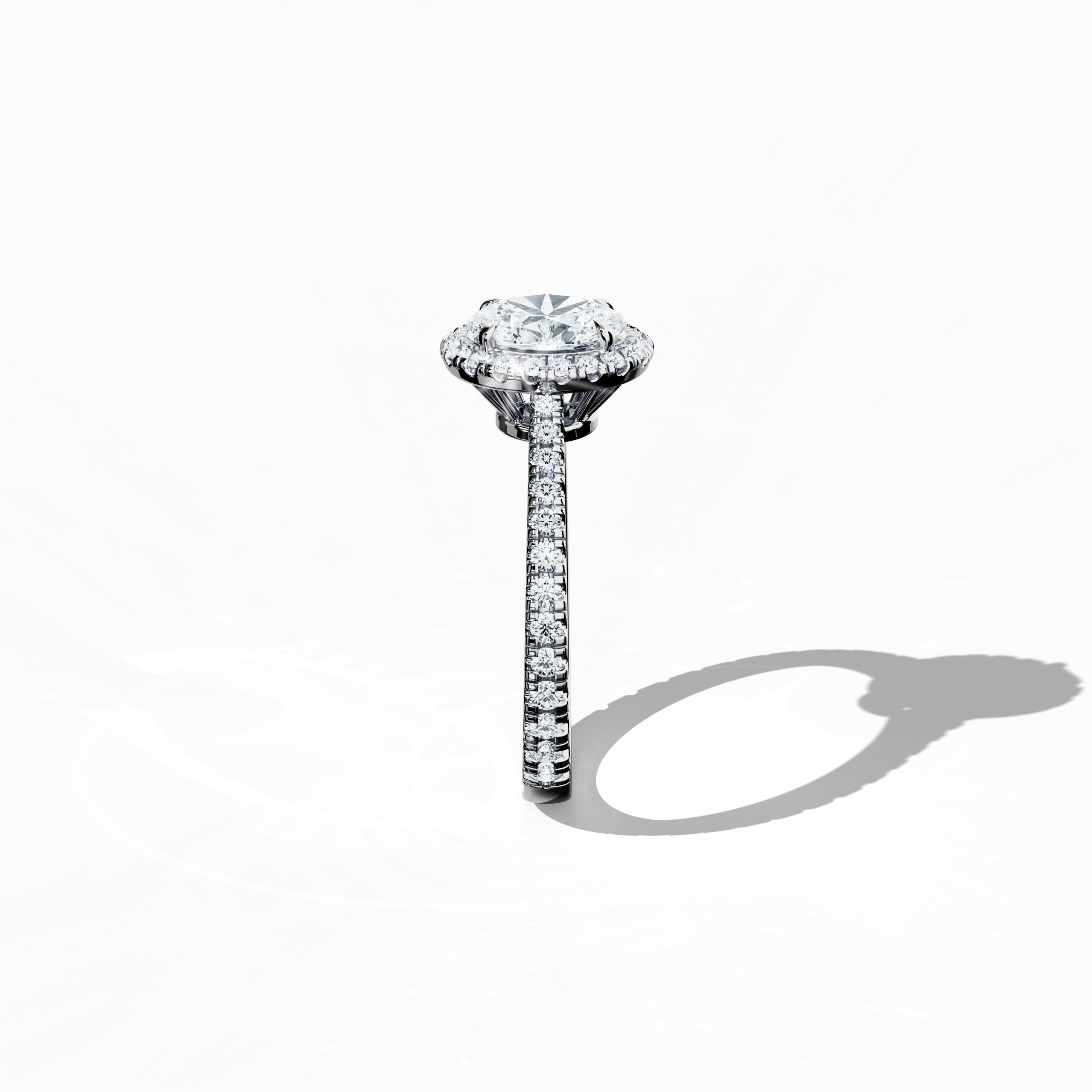 Detailed standing side view of a белое золото halo paved ring, accentuating its elegant profile and gracefully curved band adorned with a 1ct oval-cut central diamond and a 0.60ct side diamond halo. This lateral angle reveals intricate pavé detailing in white, silver, and pale gold that merges classic halo, vintage halo, modern halo, and bridal halo aesthetics. Keywords: luxury, refined design, oval brilliance, artistic detailing, modern elegance.