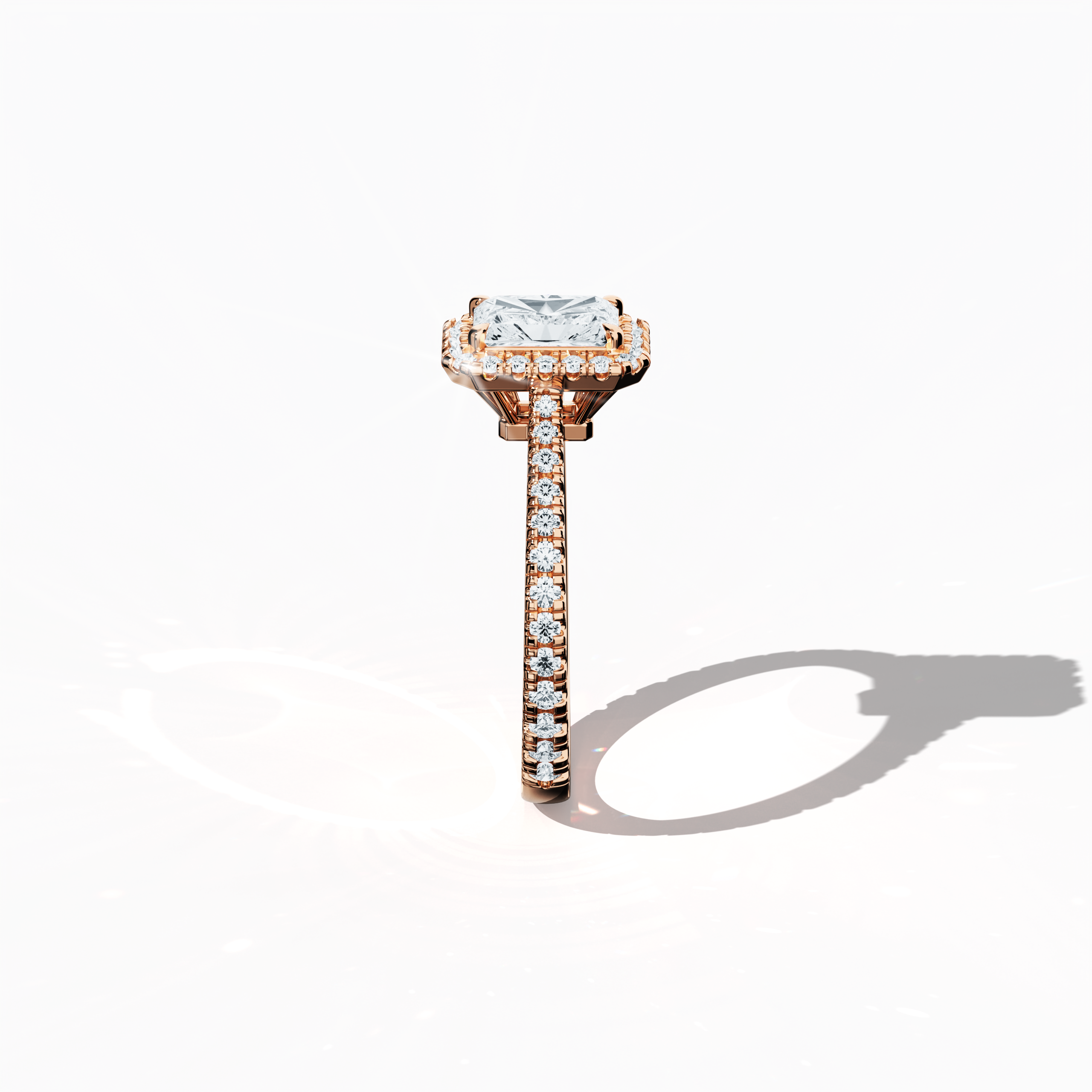 Detailed standing side view of a розовое золото halo paved ring, accentuating its graceful profile and curved band featuring a 1 carat radiant-cut center diamond with a complementary 0.60ct side diamond halo. The lateral perspective reveals intricate pavé detailing in warm rose, pink, and blush gold, fusing classic halo, vintage halo, modern halo, and bridal halo aesthetics. Keywords: luxury, refined craftsmanship, radiant brilliance, elegant design, modern sophistication.
