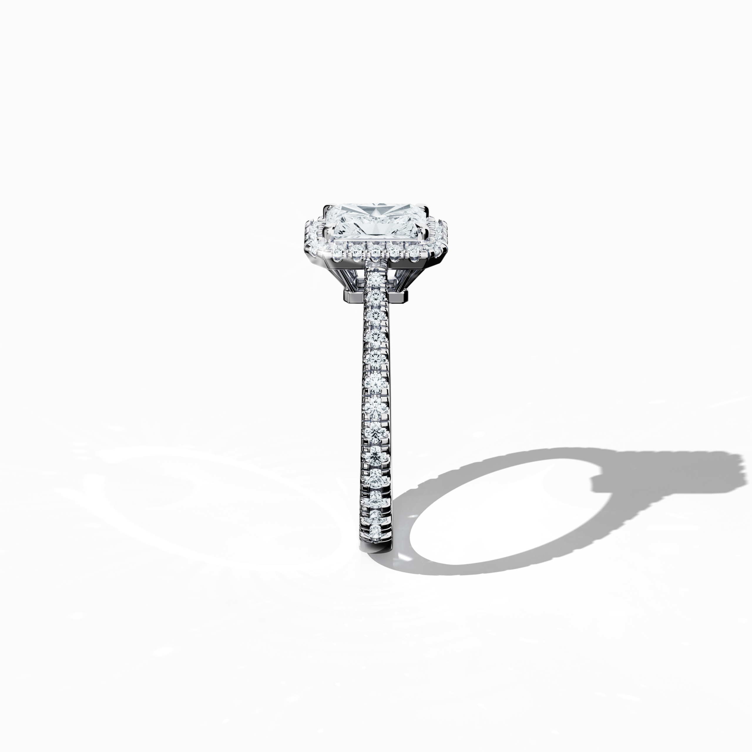 Detailed standing side view of a белое золото halo paved ring, accentuating its graceful profile and curved band featuring a 1 carat radiant-cut center diamond complemented by a 0.60ct side diamond halo. The lateral angle reveals intricate pavé detailing in white, silver, and pale gold, fusing classic halo, vintage halo, modern halo, and bridal halo aesthetics. Keywords: luxury, refined craftsmanship, radiant brilliance, elegant design, modern sophistication.