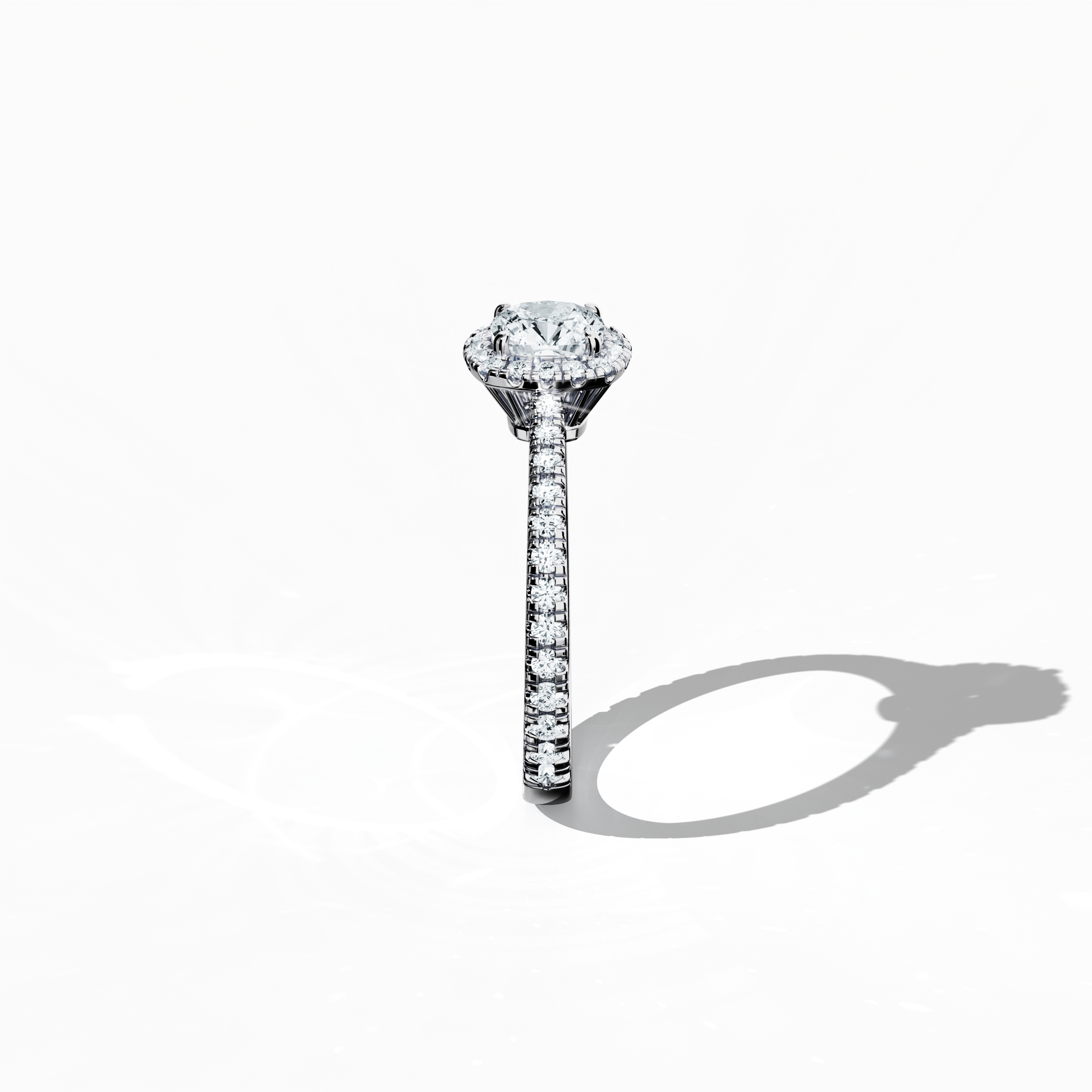 Revealed in a meticulous standing side view, this halo paved diamond ring in elegant белое золото showcases expert craftsmanship and luminous allure. The 1 карат cushion diamond centerpiece, bordered by a 0.60 карат halo of dazzling side stones for a total of 1.60 carats, combines Classic Halo, Eternity Halo, and Modern Halo design elements with cushion and princess cut accents and a refined silver-toned finish. Keywords: luxury, sparkle, создано вручную, diamond, elegant.