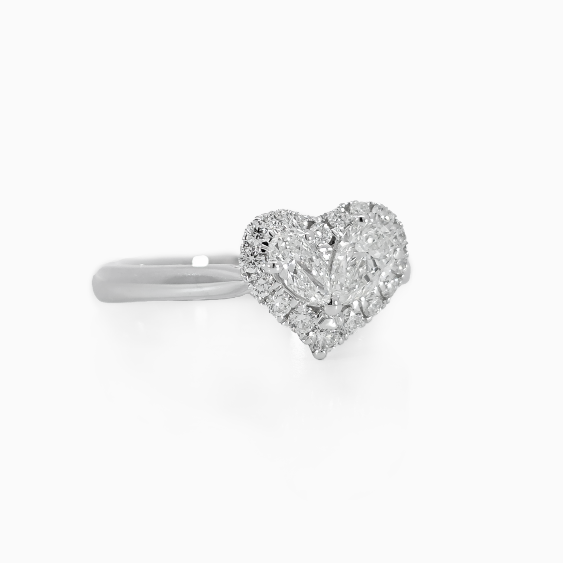 Heart shaped pear diamond halo ring