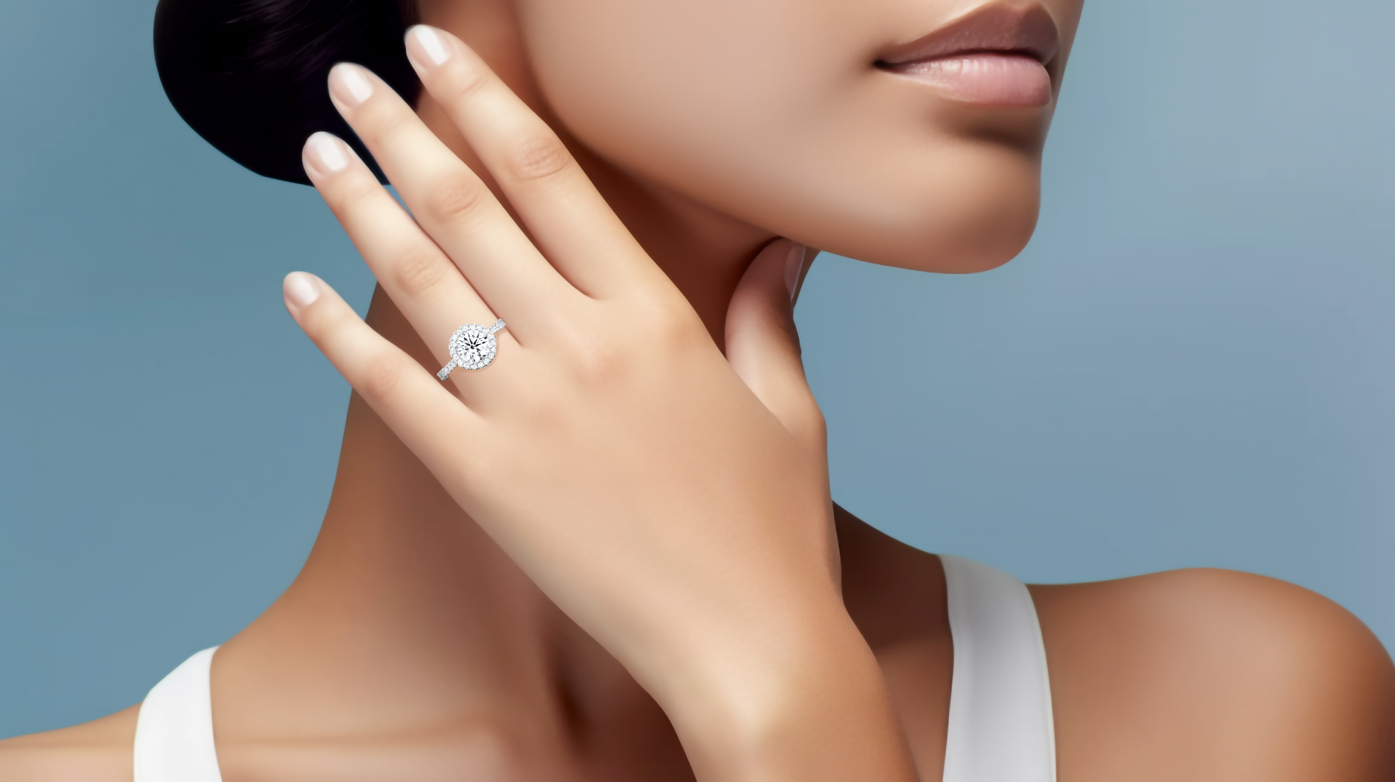 Stunning image of a белое золото halo paved ring elegantly worn on her finger, featuring a sparkling 1ct round‐cut center diamond and a surrounding 0.60ct side diamond halo. The exquisite pavé-set band in shades of white, silver, and pale gold exudes refined luxury and sophisticated craftsmanship. Incorporating classic halo, vintage halo, modern halo, and bridal halo design motifs, it radiates round brilliance, timeless style, and international elegance. Keywords: chic, graceful, statement Украшения.
