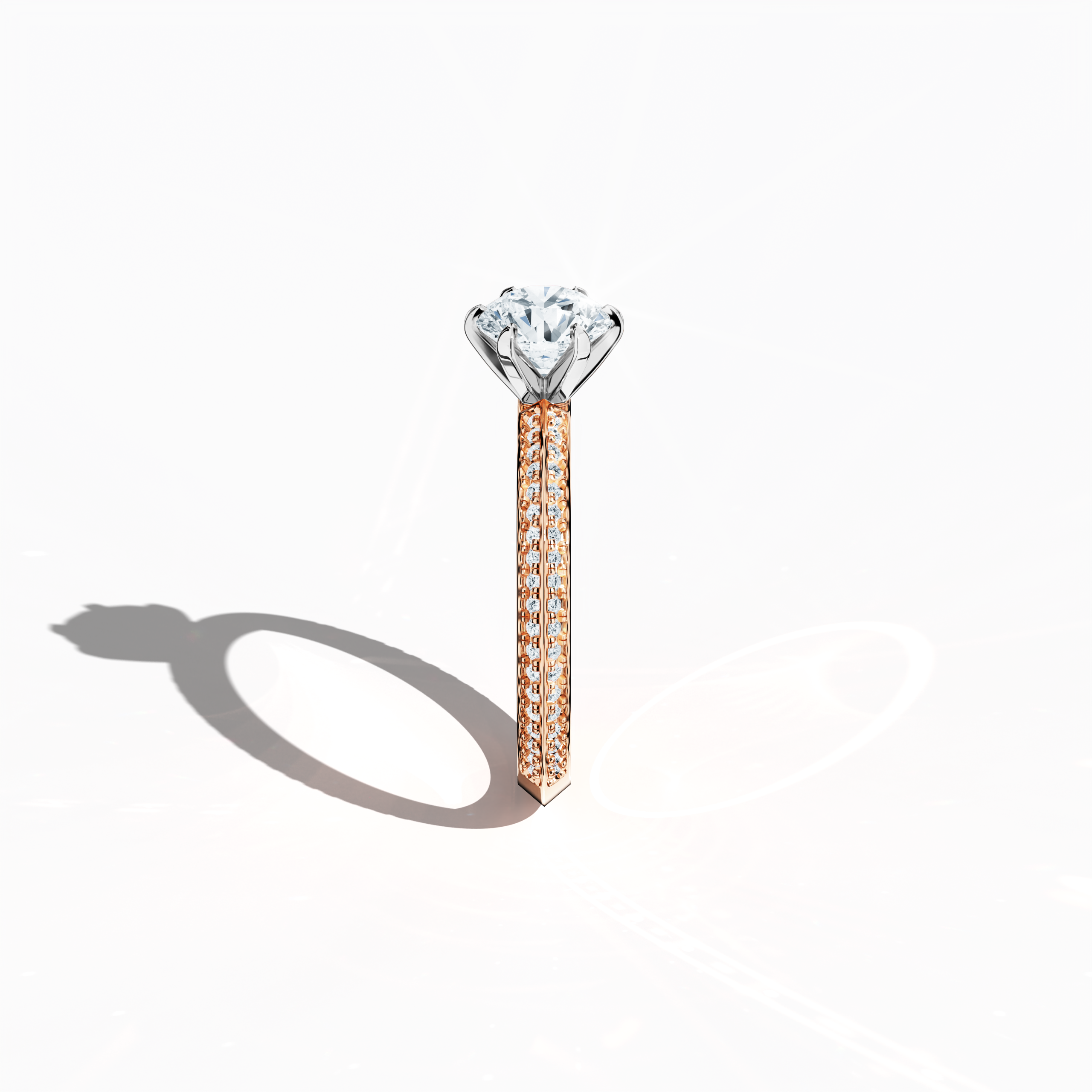 Refined solitaire paved ring with 1.40 карат diamonds – a 1 карат center diamond and 0.40 карат pavé side stones – set in soft розовое золото (blush/pink gold) with a two‑step band featuring a sharp central accent. Photographed from a standing side view, this fine Украшения/fine Ювелирные изделия ring showcases elegant contours and warm, romantic allure.