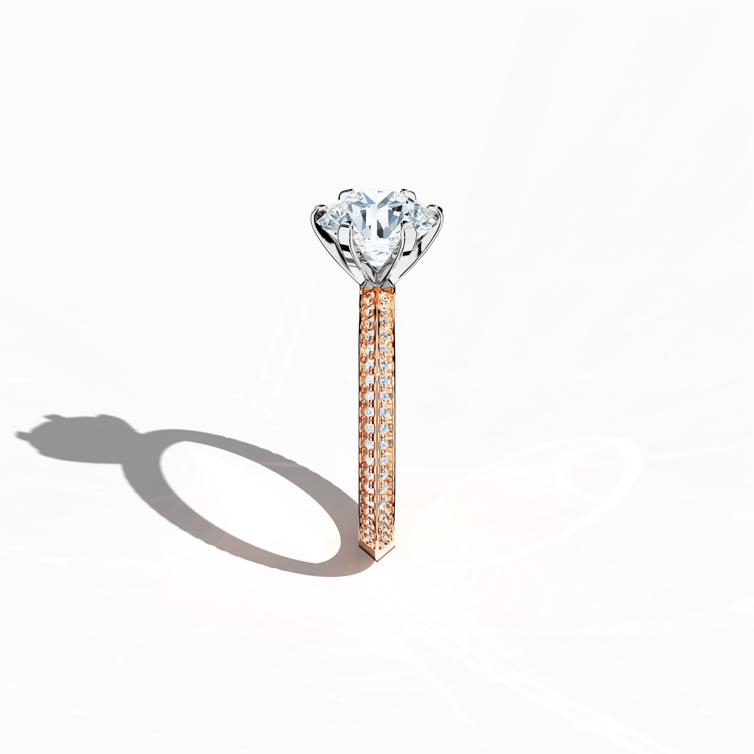 Refined solitaire paved ring with 2.40 карат total diamonds (2 карат center, 0.40 карат side stones) in a six‑prong setting and a two‑step band with a sharp central line, set in soft розовое золото (blush/pink gold). Photographed from a standing side view, this fine Украшения/fine Ювелирные изделия ring showcases its elegant contours and warm, romantic allure.