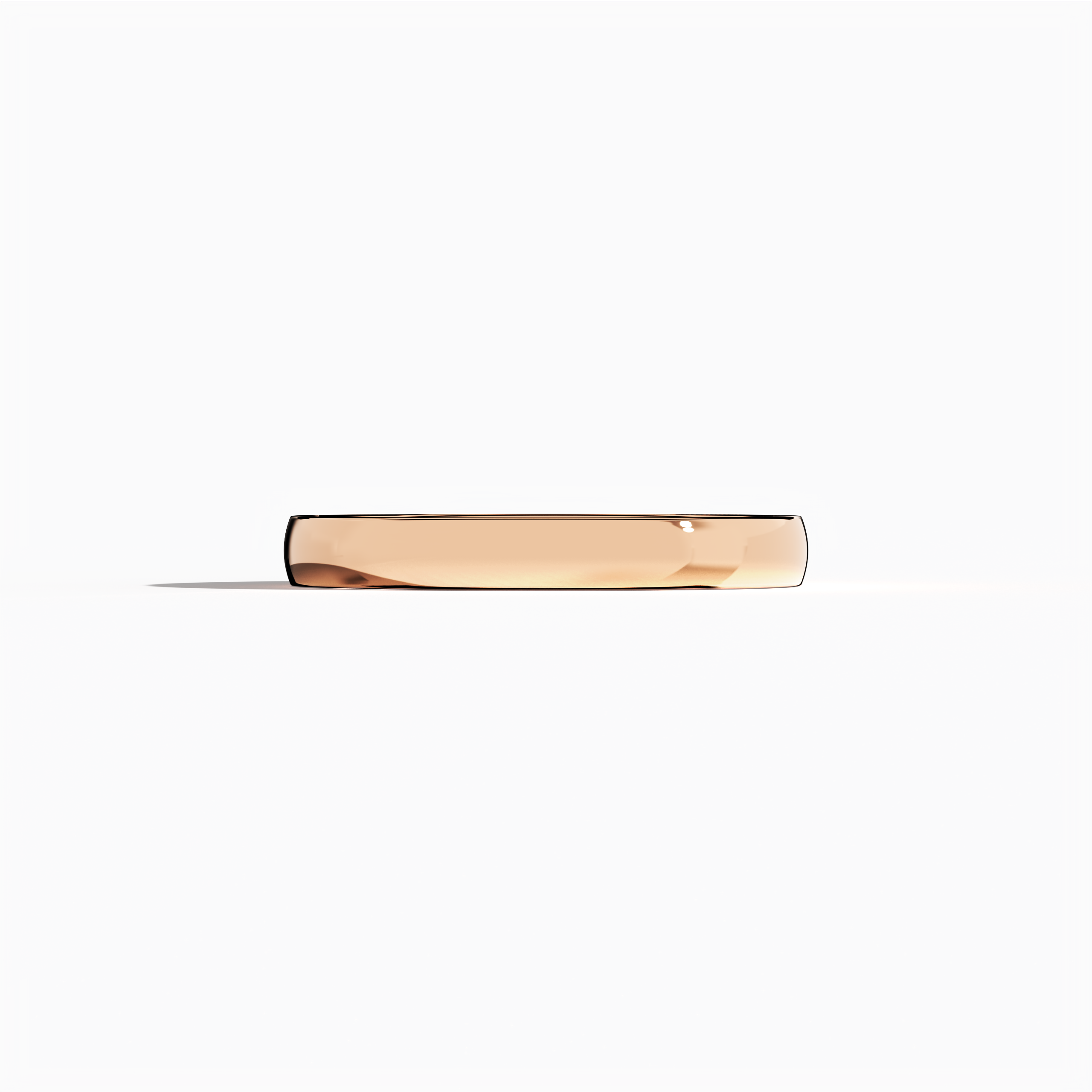 This image showcases a stunning розовое золото wedding band with a simple, elegant design and a glossy finish along its 2.5 мм width. Crafted in minimalist, plain, classic, timeless, and understated wedding band styles—and also described as blush gold or romantic rose—the band’s smooth, polished surface reflects ambient light gracefully, highlighting refined craftsmanship and modern luxury. Keywords: wedding band, розовое золото, glossy finish, minimalist, elegant design.