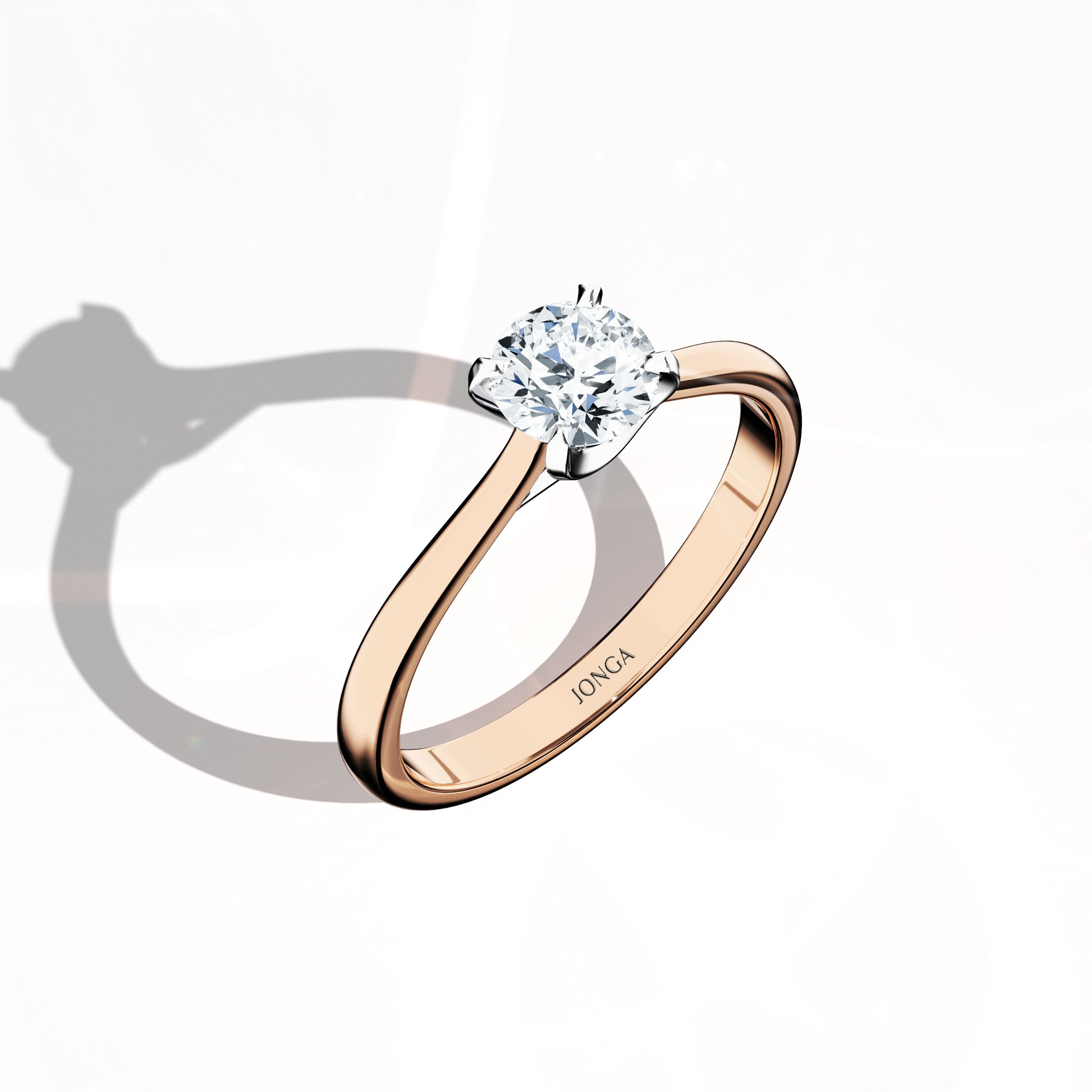 Modern solitaire diamond ring with a 0.70  карат center diamond in a unique twisted bottom design and four‑tap белое золото prongs, set in a soft розовое золото band (blush/pink gold). Captured from a standing front top side angle, this fine Украшения/fine Ювелирные изделия ring emphasizes its brilliant sparkle and delicate, romantic finish.